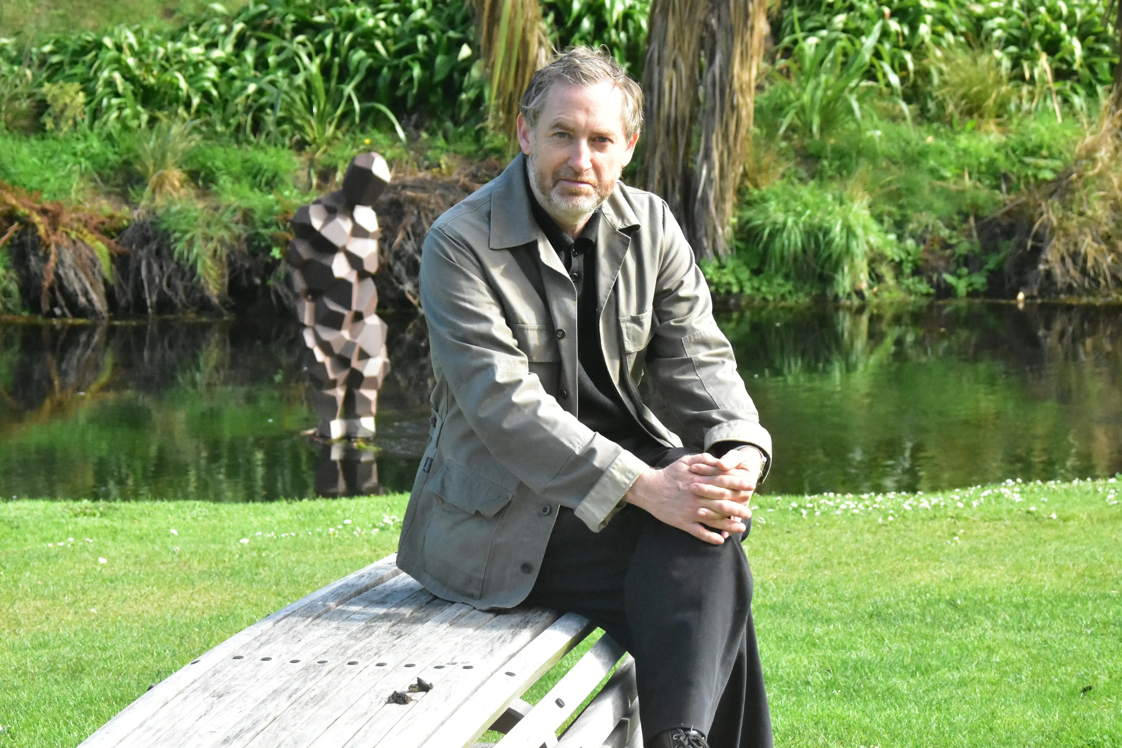 SCAPE managing curator Aaron Kreisler in front of Antony Gormley\\u2019s STAY. Photo: Raphael Franks