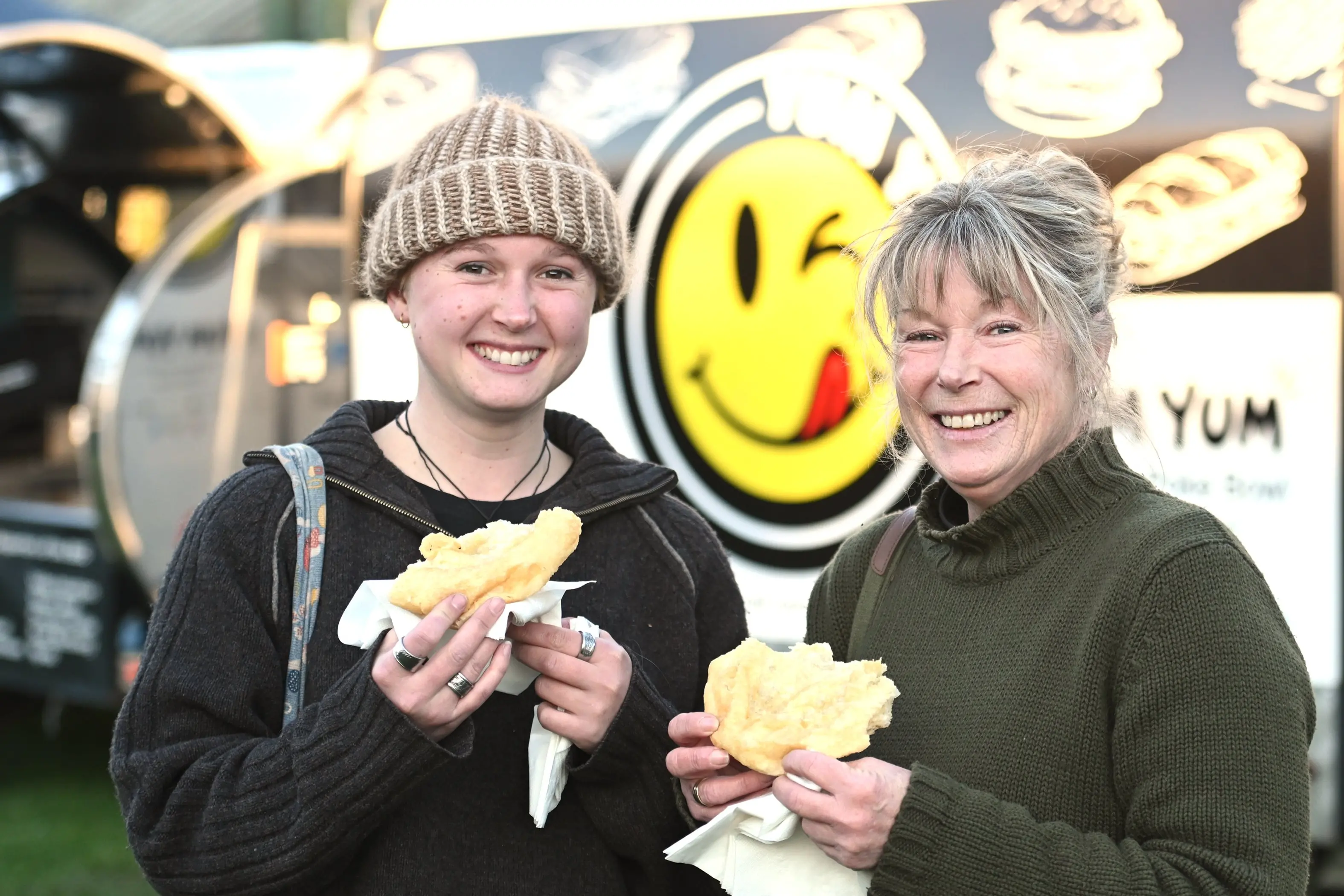 Renee Templeton (left) and her mother Alaina Templeton, of Dunedin, enjoy some kai at a night market on Friday held at Araiteuru Marae. Photo: Linda Robertson