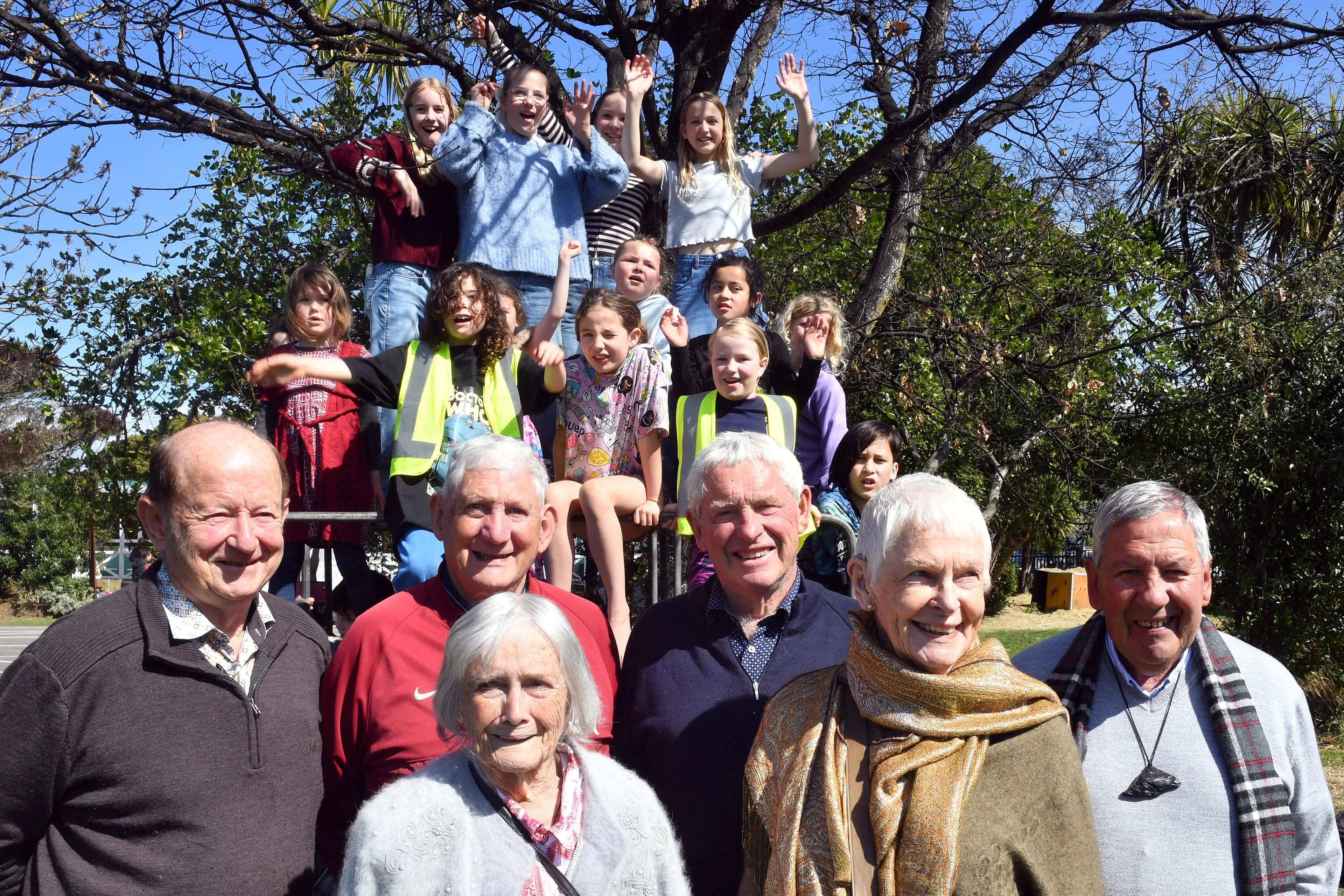 Former  Karit\\u0101ne School pupils (from left) Robyn Jackson, 75, Kathy Coombes, 77, Colin Ellison, 80, Vince McLachlan, 78, Isobel Weir, 91, and Roger Wyeth, 77, with present pupils of the school during its 150th anniversary celebrations on Saturday. Photo: Stephen Jaquiery