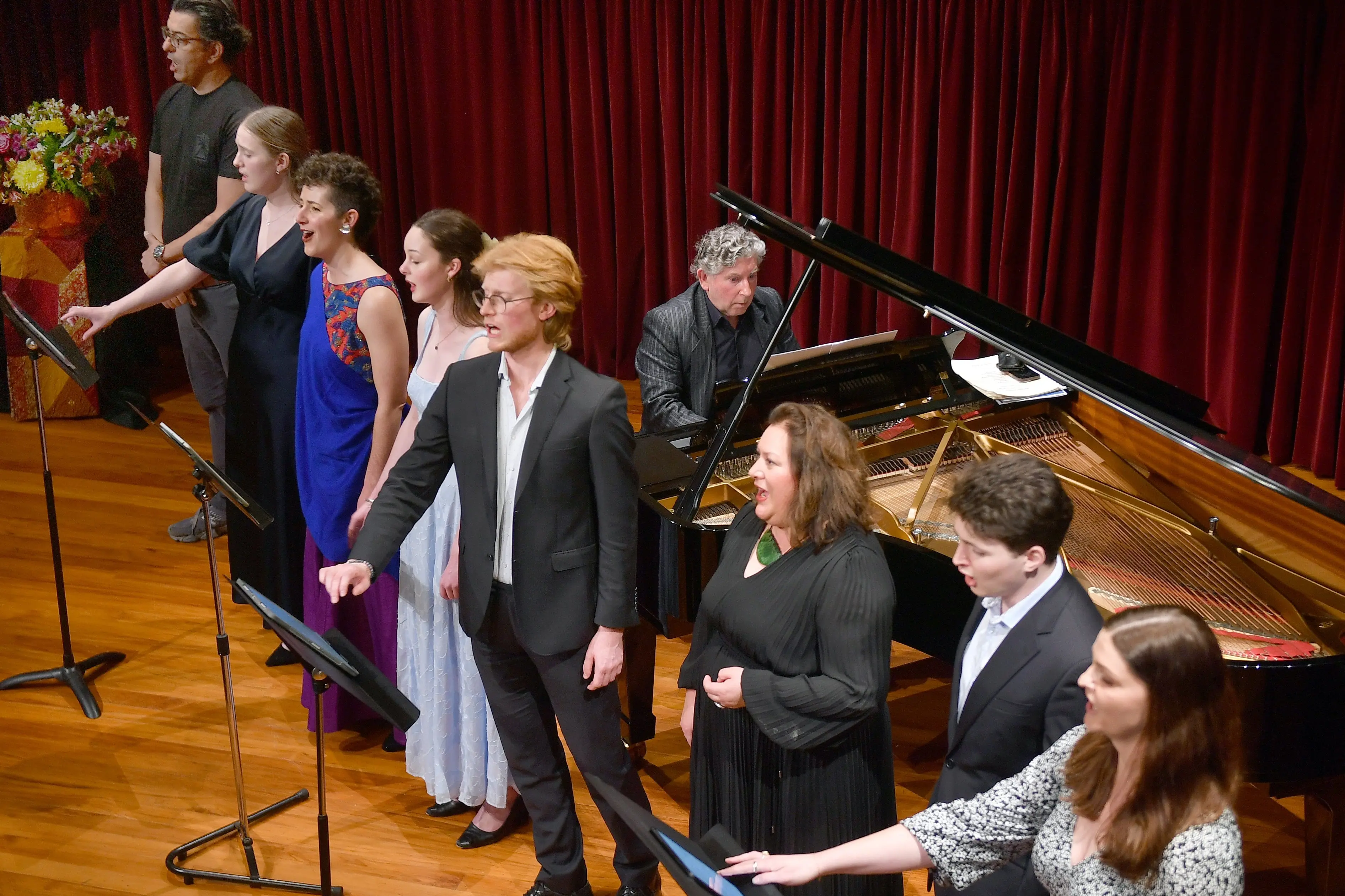 Performers put on a special show to celebrate 100 years of the department of music at the University of Otago.\\n\\nOn stage for\\u00A0the finale\\u00A0to the centennial concert are (from left) Cem Beran Sertkaya, Eva Stein, Tessa Romano, Ameera Woods, Teddy Finney-Waters, Rebecca Ryan, Kieran Kelly and Rhiannon Cooper, along with\\u00A0Prof Terence Dennis on the piano. Photo: Stephen Jaquiery