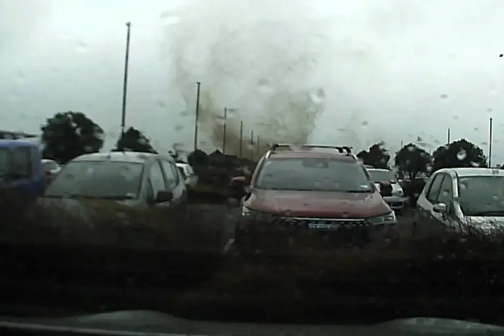 The tornado tore through the carpark on Sunday afternoon. Photo: supplied