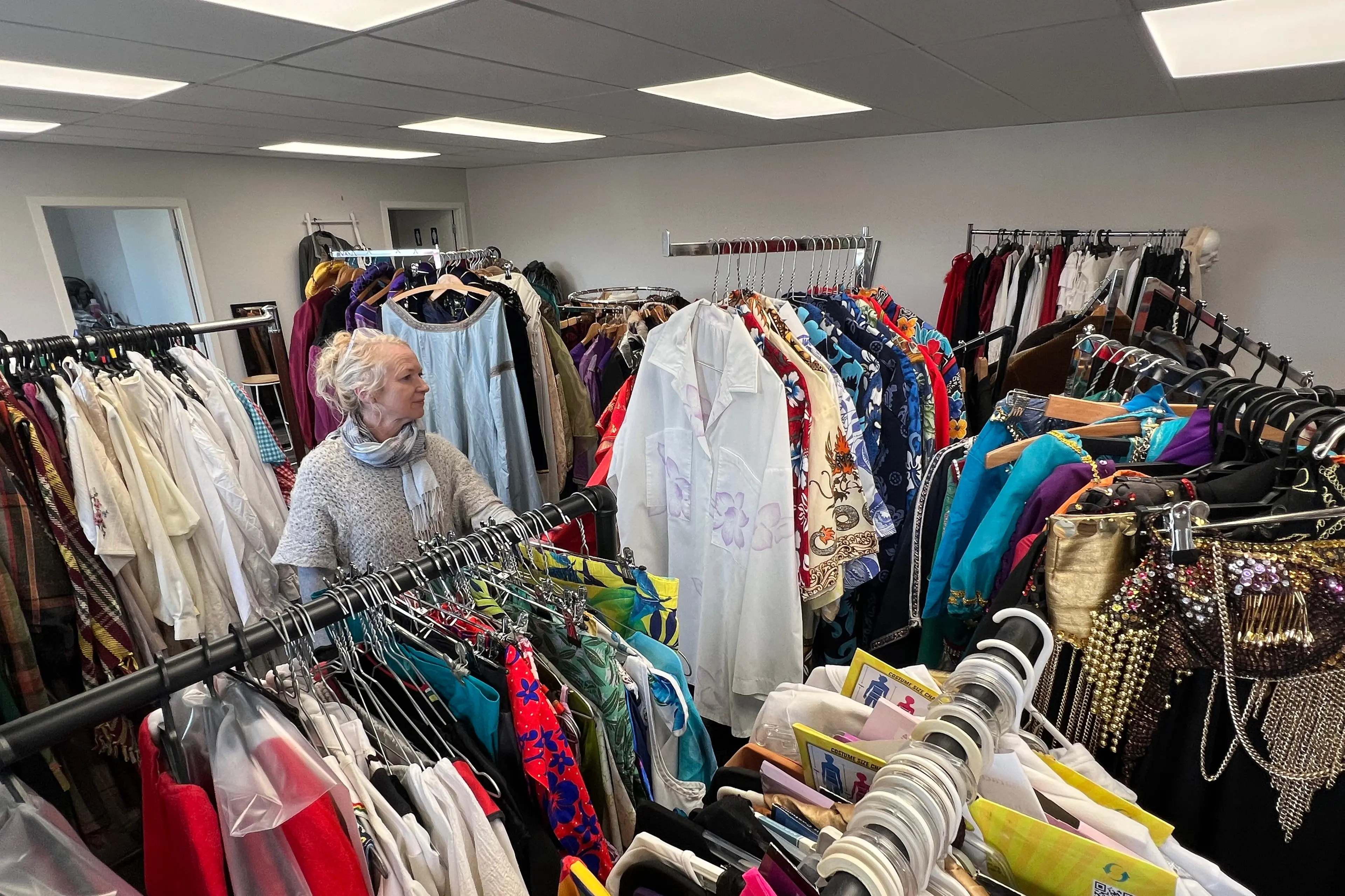 Owner Jo Staveley among the historic costumes now housed at Pacific Linen\\'s new Cromwell premises. Photo: Carys Trotter