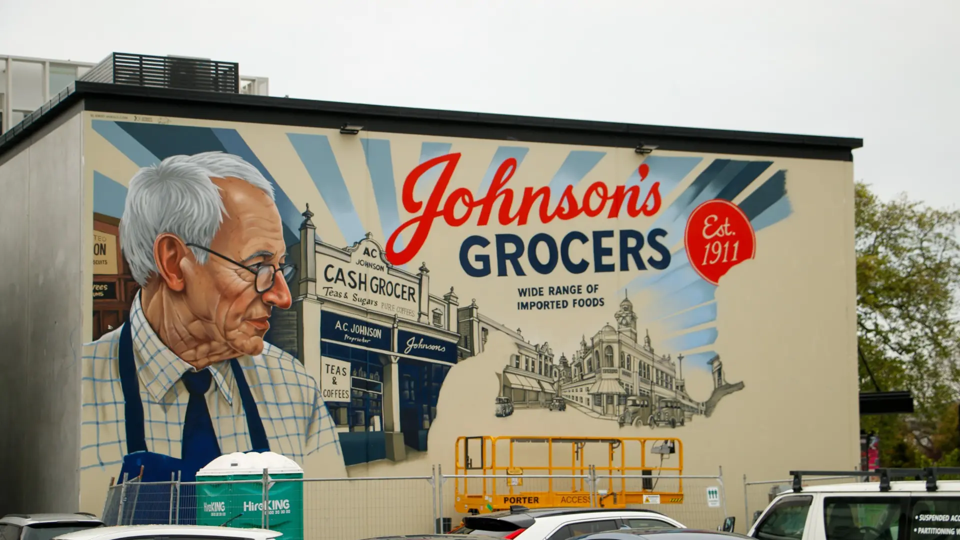 Mural updated to show Johnson’s Grocers store