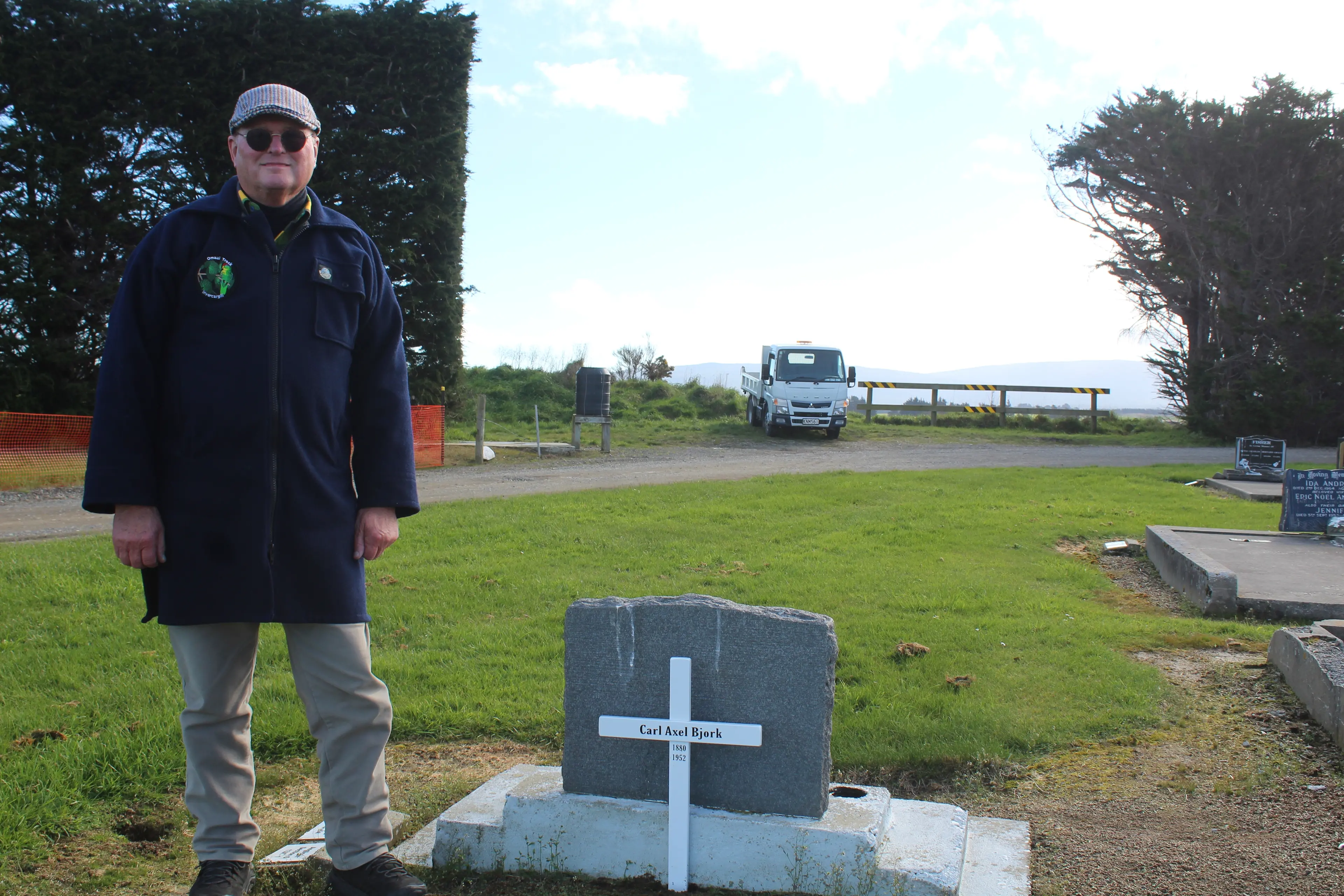 Greg Warden places a cross for the hermit of Preservation Inlet, Carl Axel Bjork, on Friday, at Riverton Cemetery. Photo: Tayler Mutton
