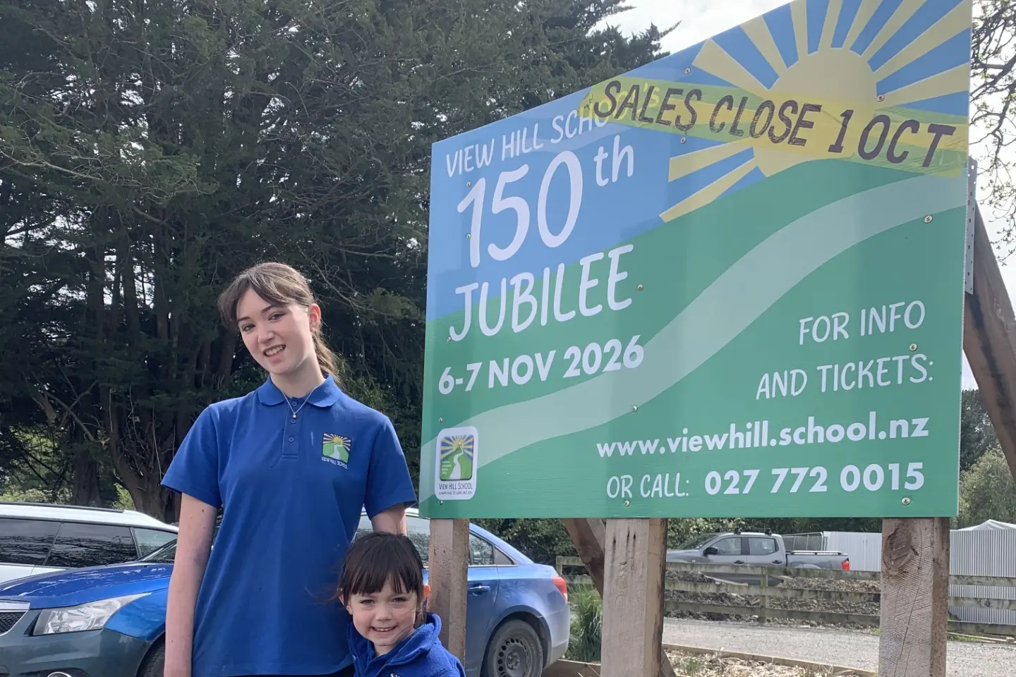 Jubilee garden . . . Year 8 student Betsy-Jo Chun and Tallulah Orman-Pereira, a Kiwinest junior pupil, beside a new landscaped area at the school. Photo: Supplied