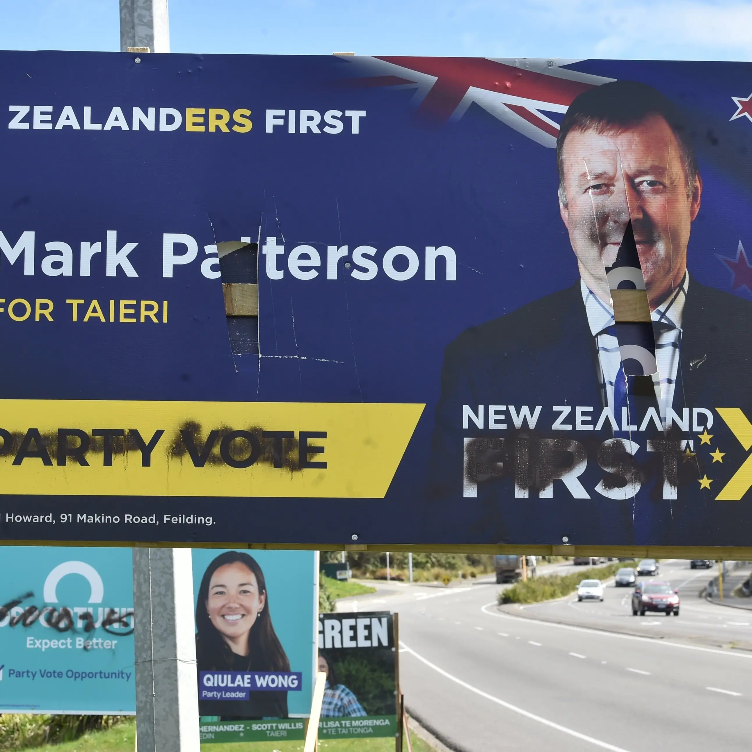 Bashed and beaten billboards no replacement for political debate, candidates say