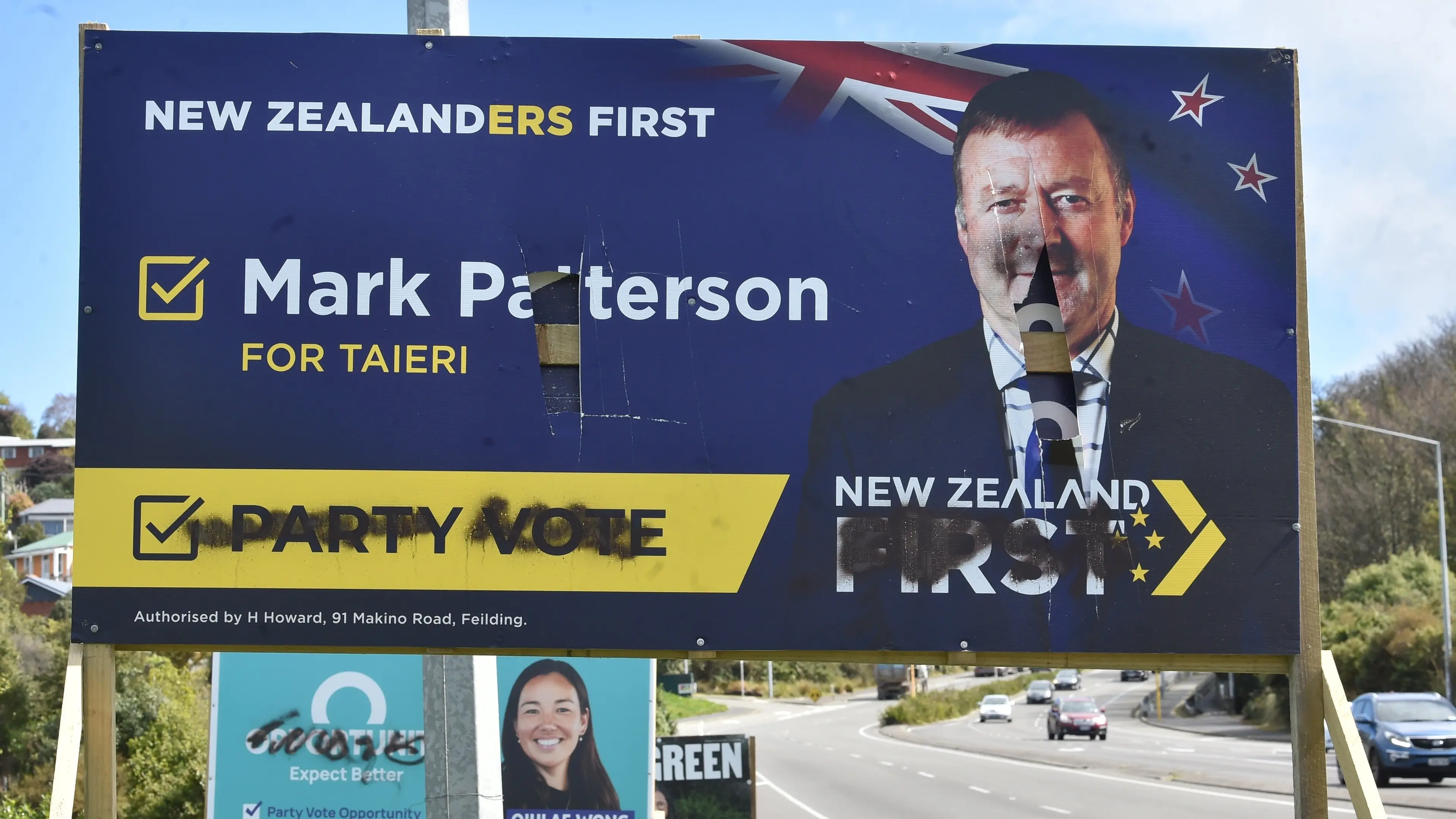 Bashed and beaten billboards no replacement for political debate, candidates say