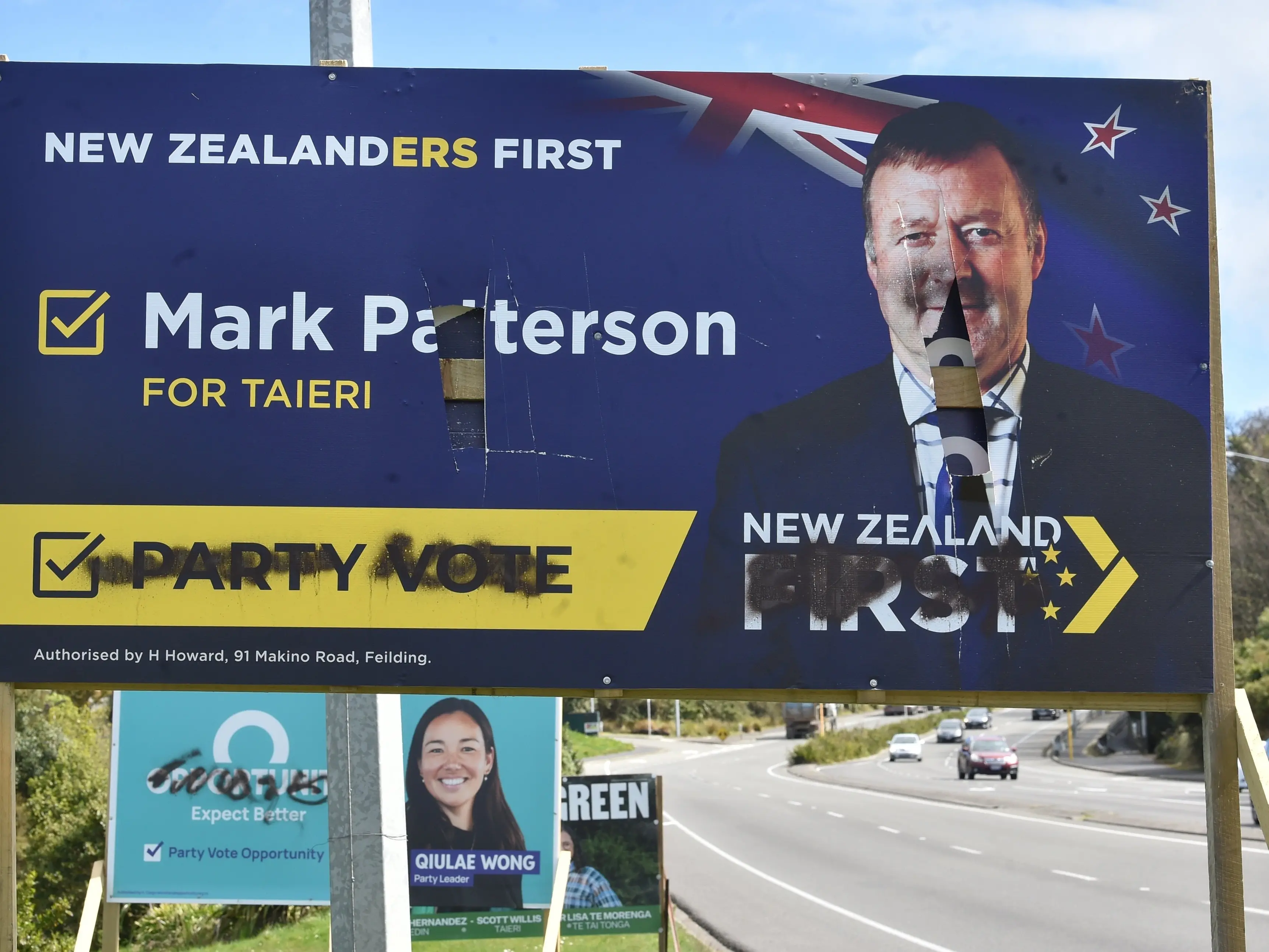 Bashed and beaten billboards no replacement for political debate, candidates say