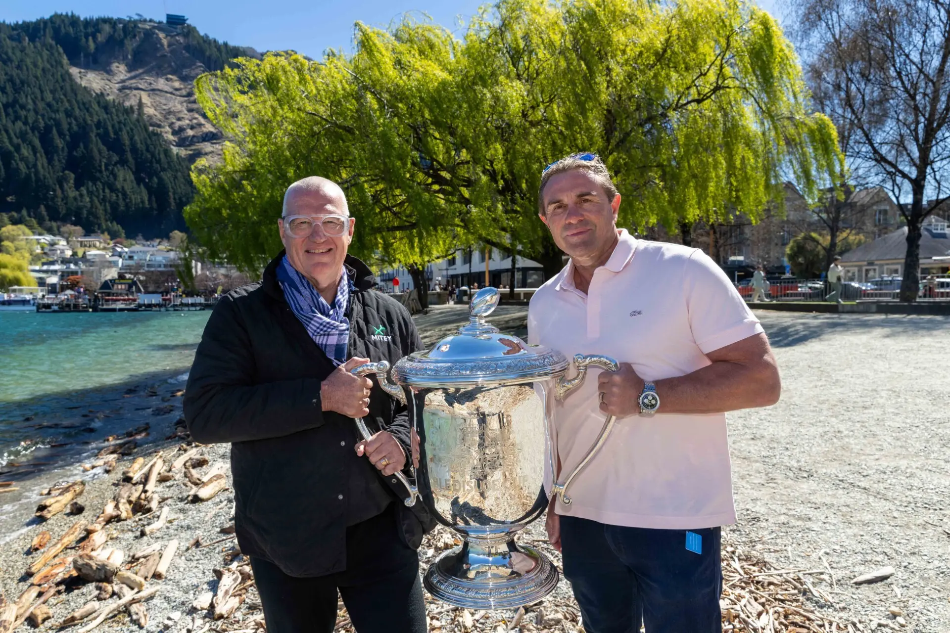 Spoils of victory: Former All Blacks Sir John Kirwan, left, and Justin Marshall pictured with the Bledisloe Cup in Queenstown on Tuesday. Photo: James Allan Photography