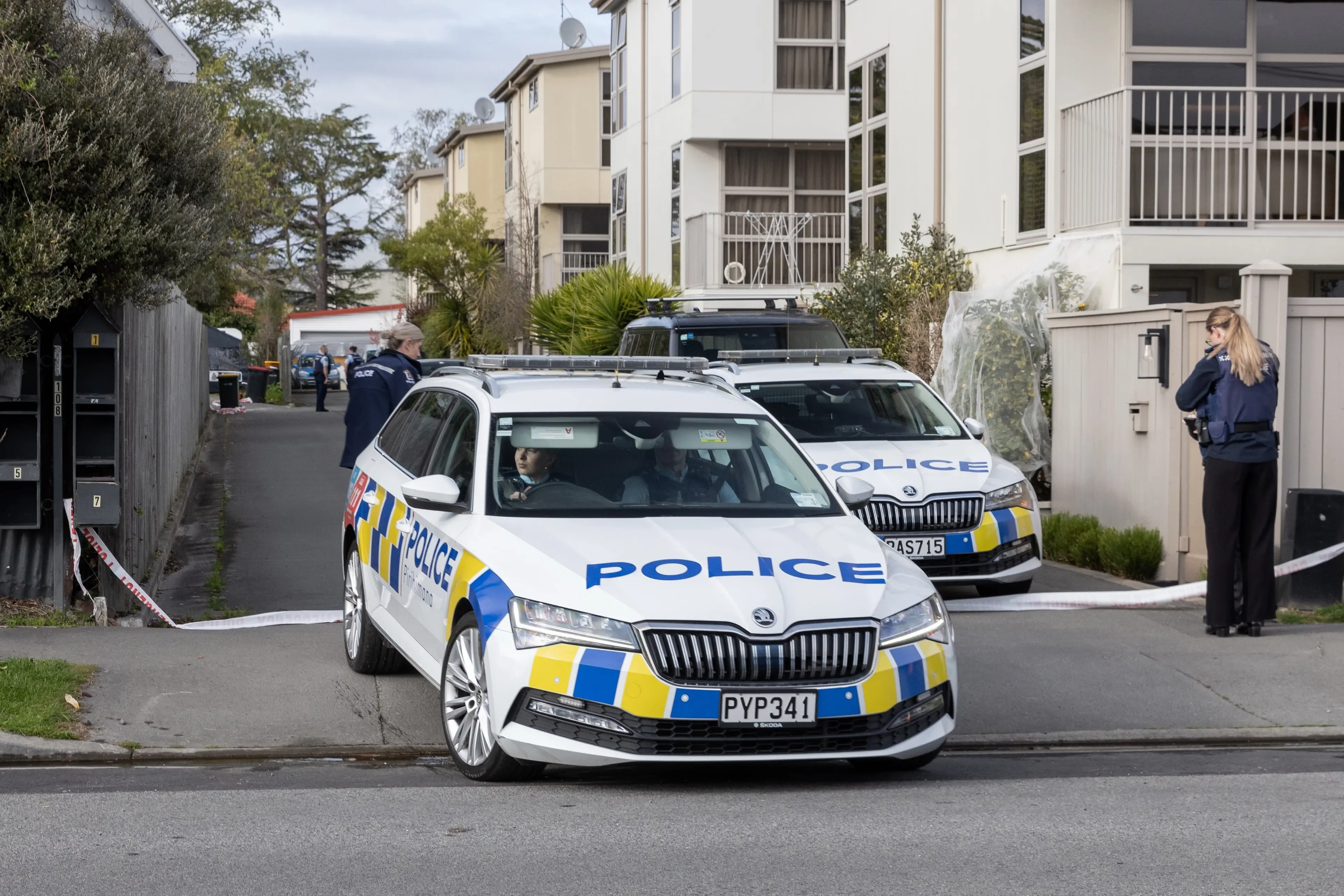 Police at the scene of the murder on Purchas St in Christchurch.