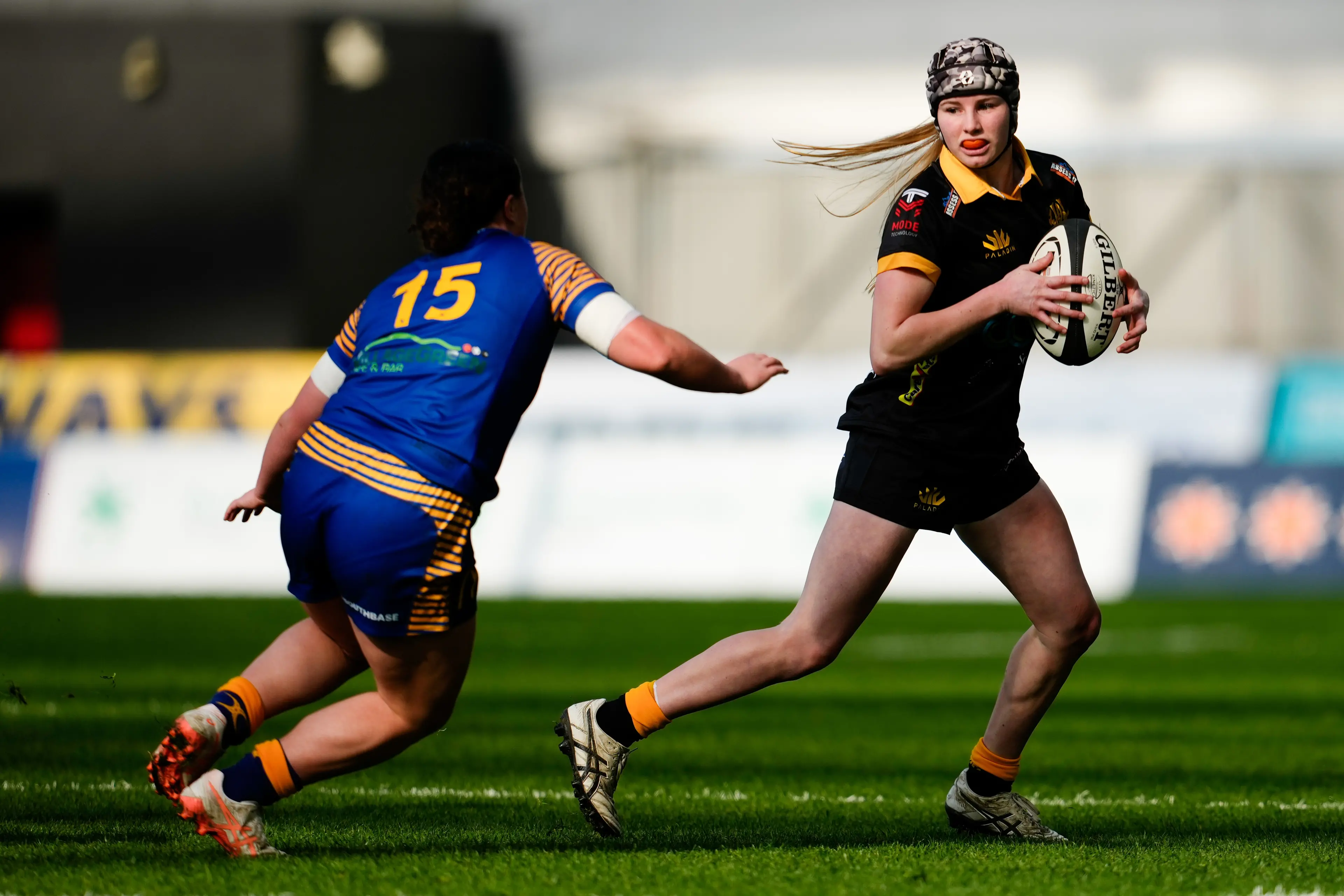 Elusive Wellington outside back Anastasia Kerr tries to get around Otago Spirit fullback Oceana Campbell during the Farah Palmer Cup season opener in Dunedin. Photo: NZ Rugby/Smartframe