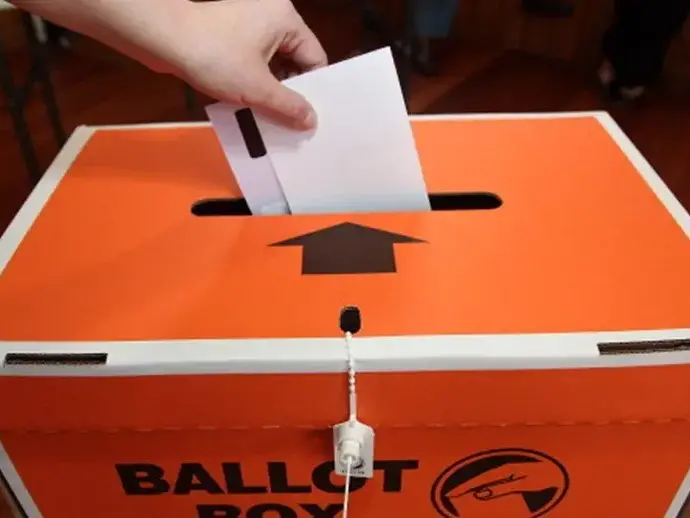 Explainer: Not enrolling to vote is against the law
