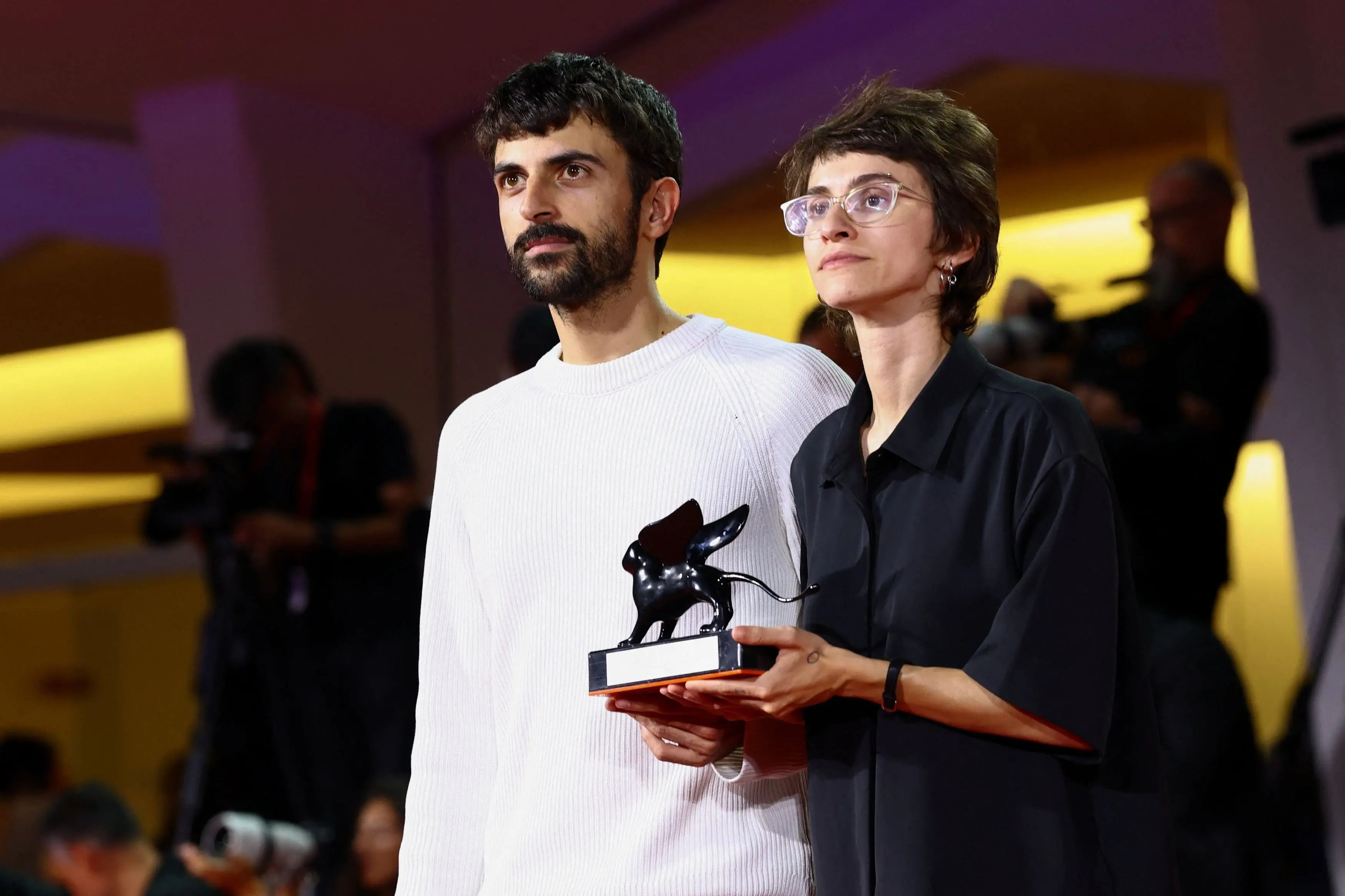 Directors Yuval Abraham and Rachel Szor pose with the Special Jury Award for \"Naza\" during the closing ceremony of the 83rd Venice International Film Festival, Italy. Photo: REUTERS