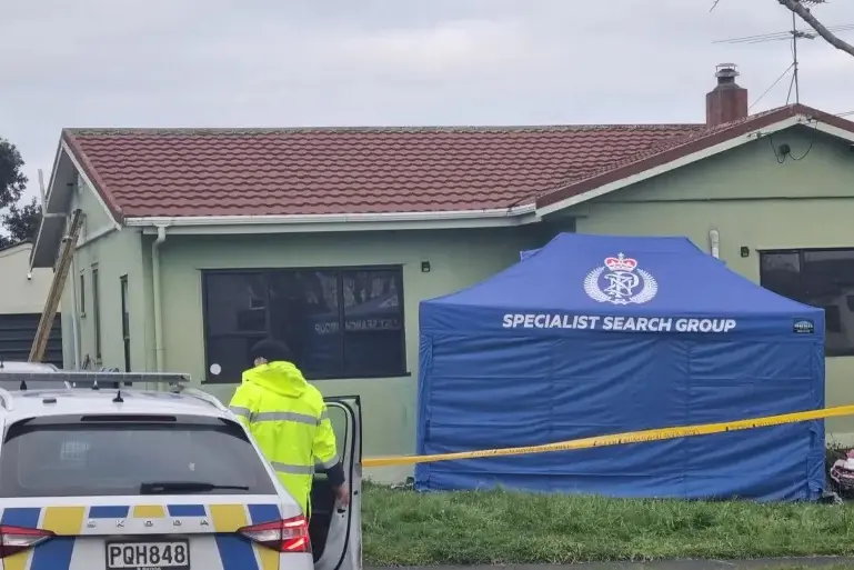 Police at the scene in Papatoetoe on Friday. Photo: RNZ
