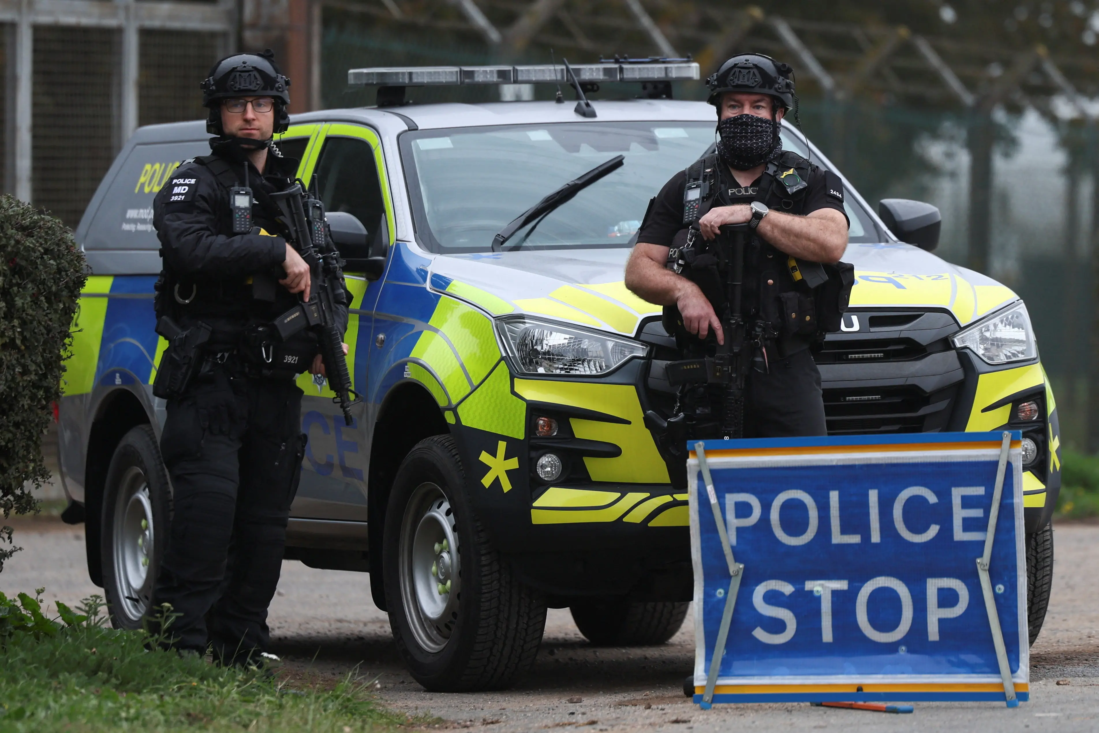 Police officers stand guard near the scene following the incident. Photo: Reuters