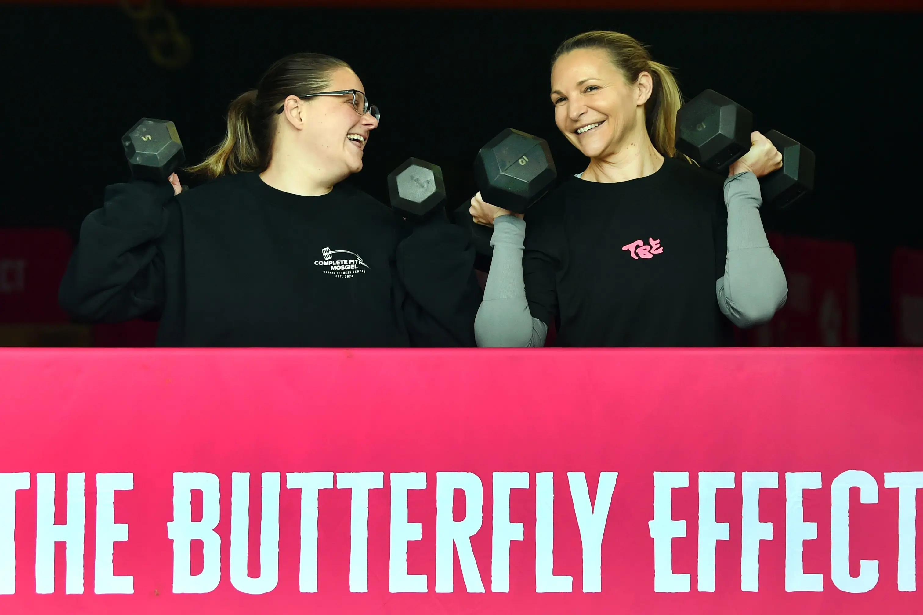 Rebecca van der Hilst, of Mosgiel, (left) and Butterfly Effect Competition co-founder Karly Kentwell, of Queensland, prepare for the competition at Complete Fitness Mosgiel. Photo: Peter McIntosh