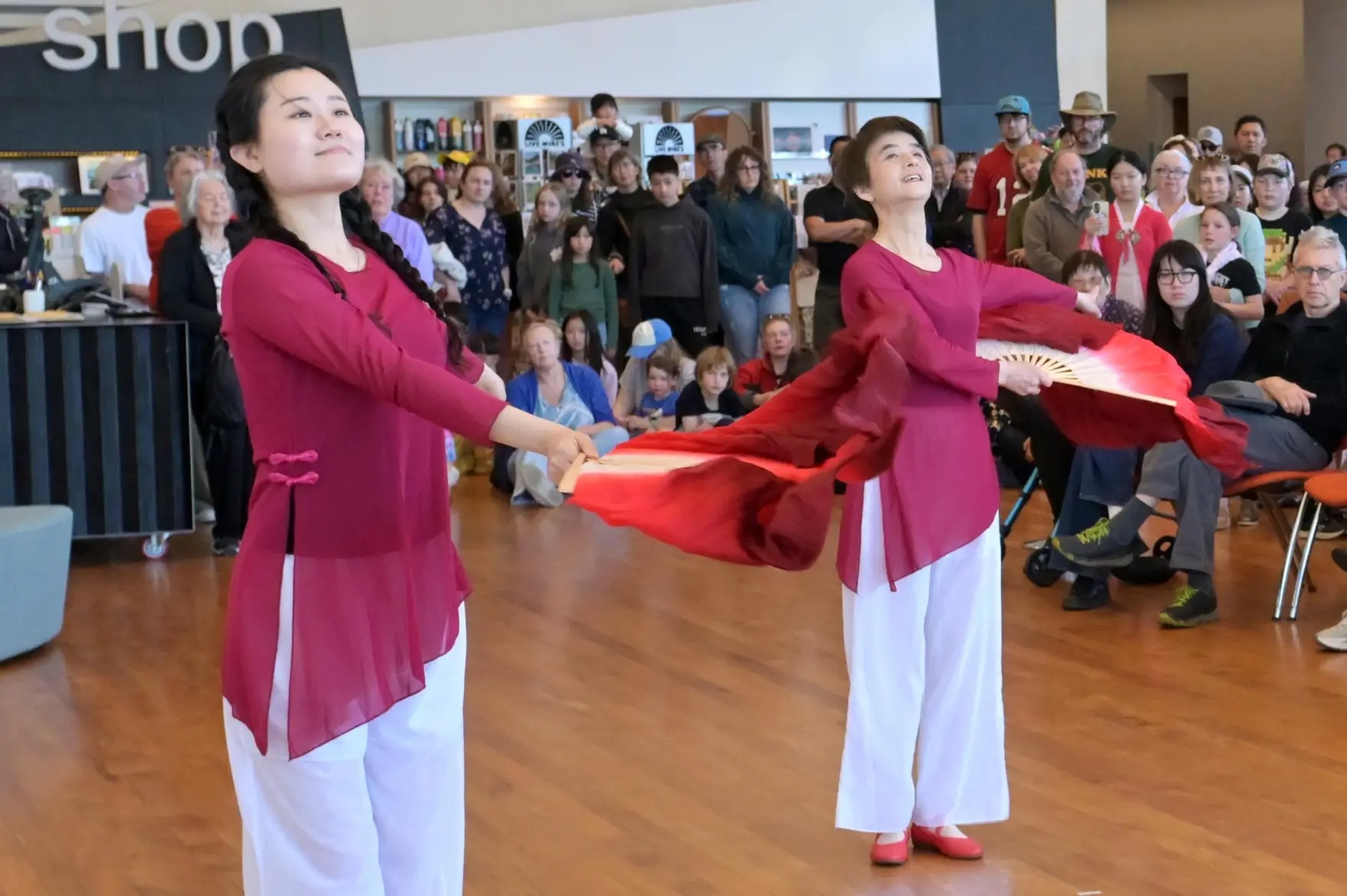 Chinese and cultural arts association dancers (from left) Zi Yi Ma, Yiwen Zheng and Yi Li dance during the start of Chinese Moon Festival in in the Toit\\u016B Otago Settlers Museum on Sunday. Photo: Gerard O\\'Brien