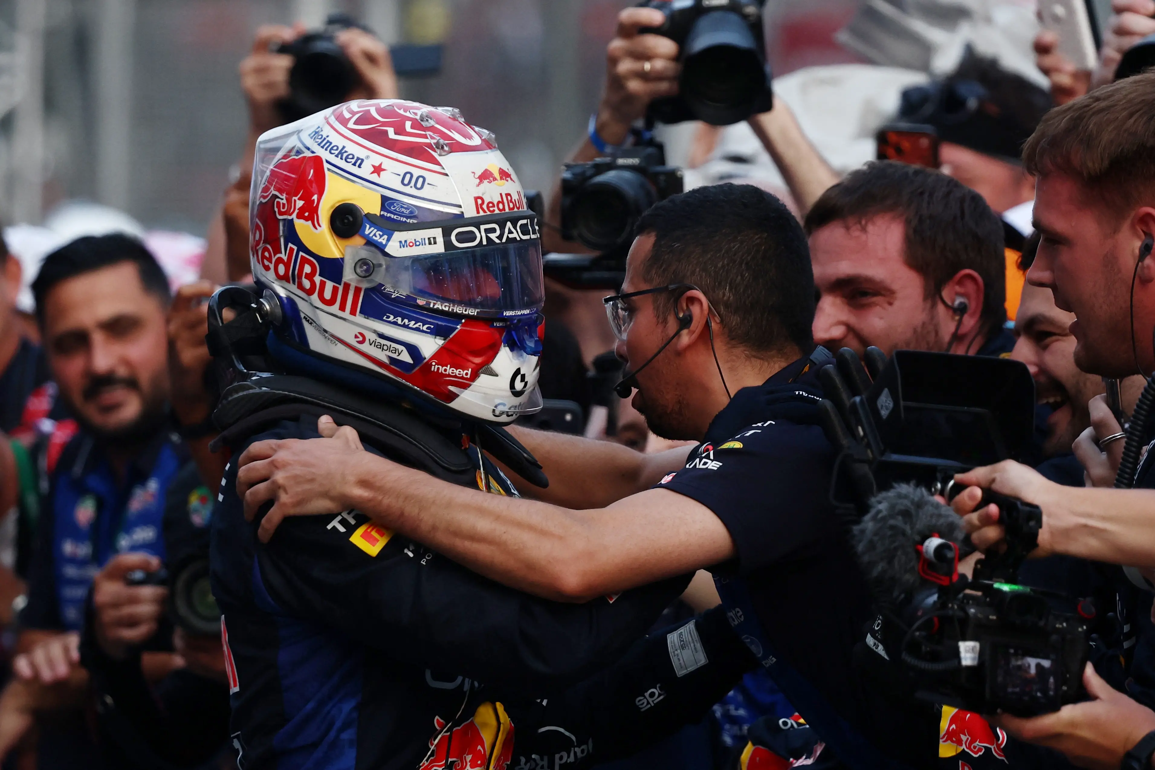 <p>Max Verstappen celebrates with crew after winning the Bahrain GP in Malaysia. Photo: Reuters&nbsp;</p>\\n