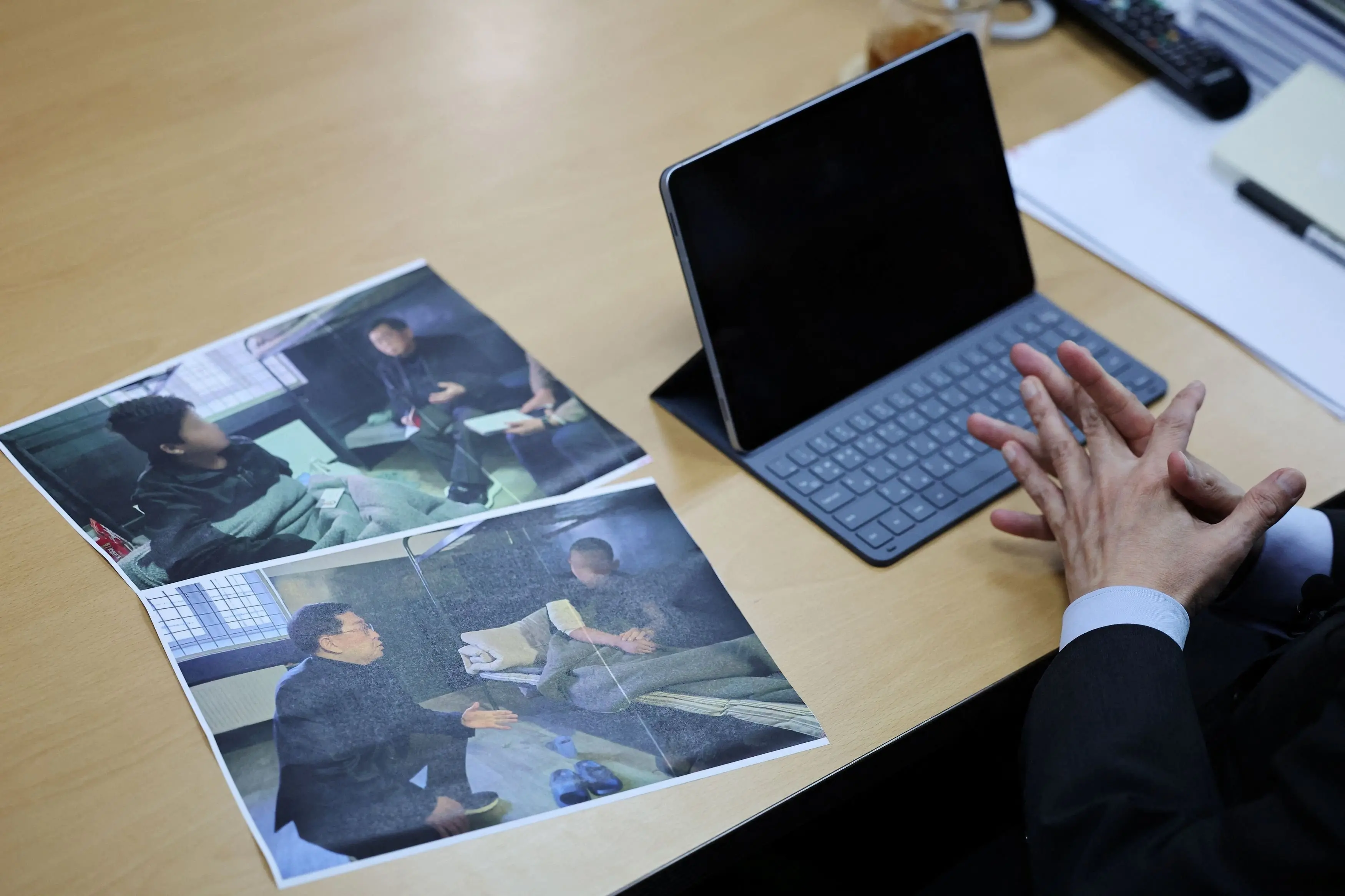 South Korean opposition politician Yu Yong-weon made public photos showing two North Korean POWs recently transferred from Ukraine to South Korea. Photo: Reuters