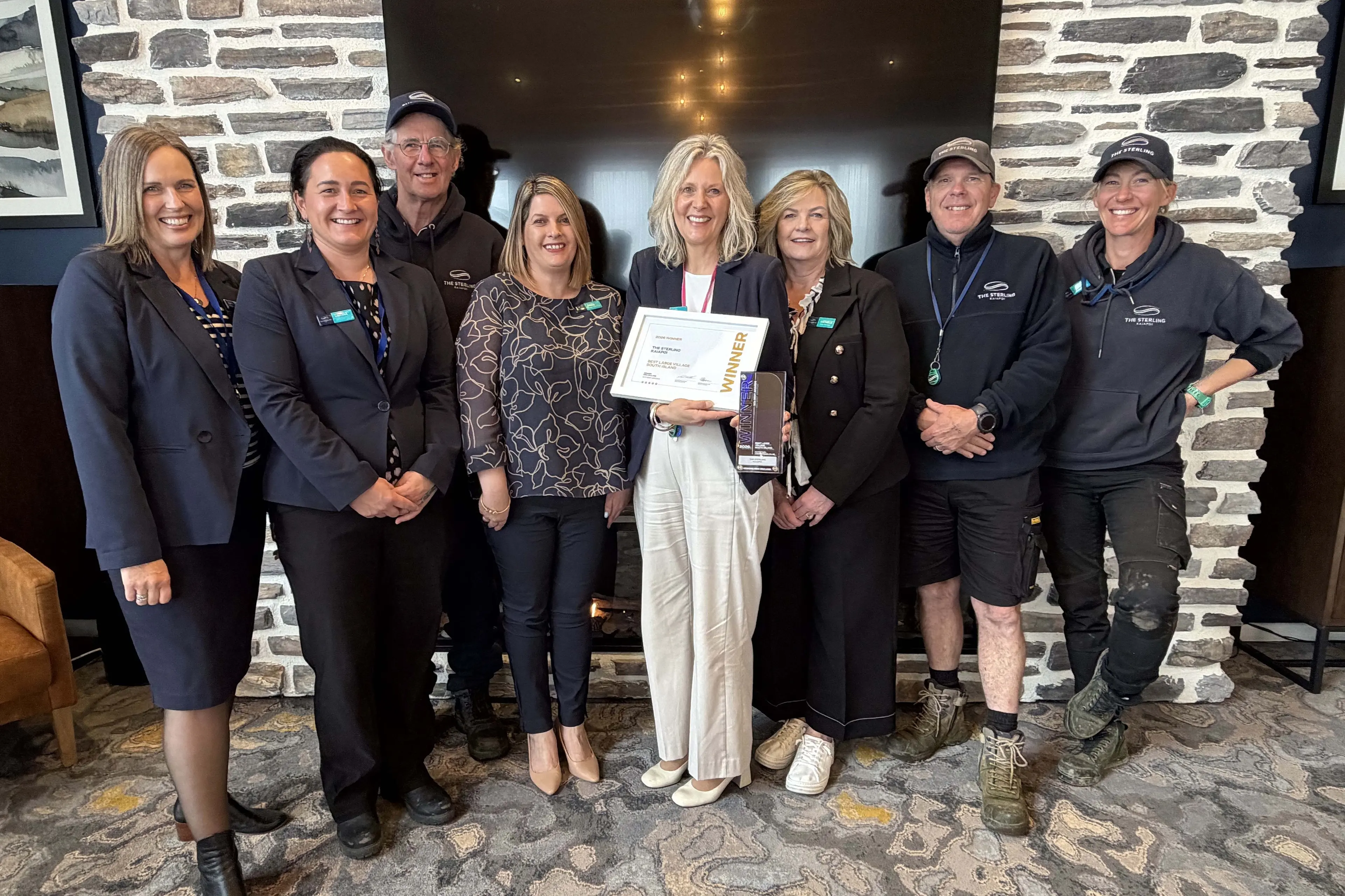 Two times a winner . . . . The team at The Sterling, Kaiapoi, celebrate their second win when they were named the Best Large Retirement Village in the South Island. Photo: Supplied