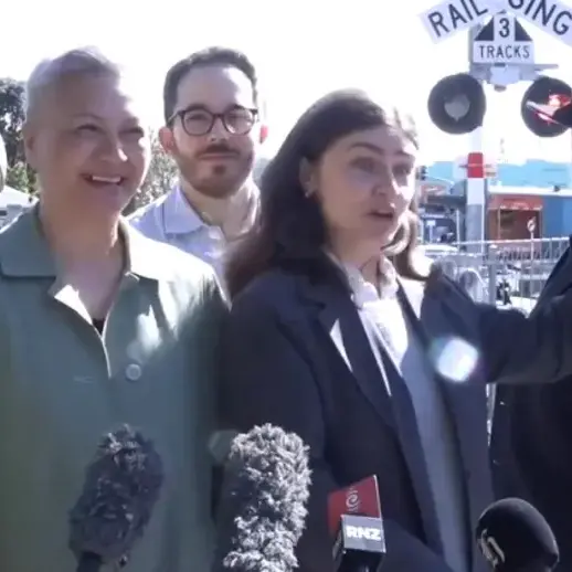 Near-miss with train interrupts Greens' level crossing announcement