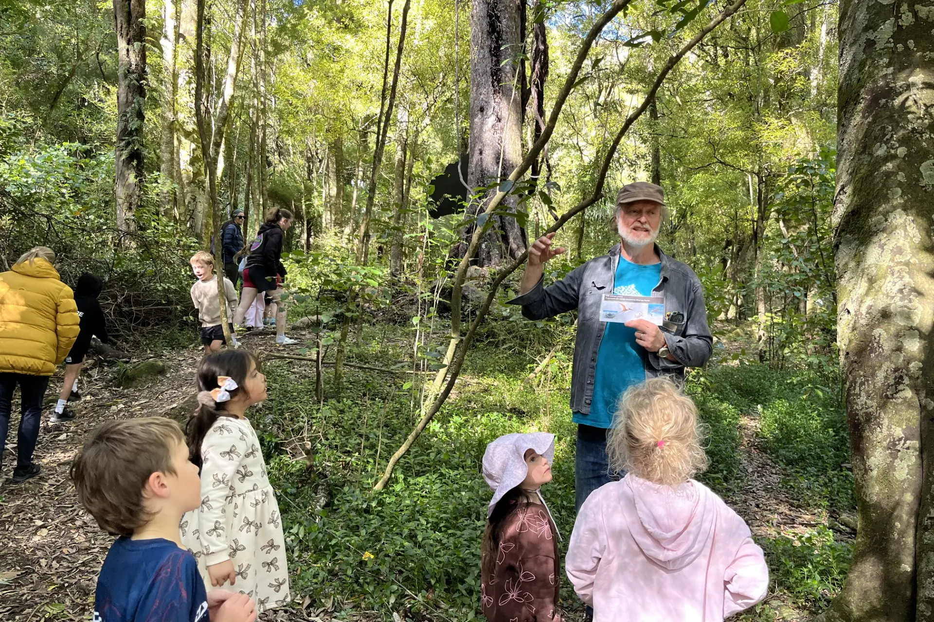 Educator Richard de Hamel explains the native bush environment to people attending the open day at Mistletoe Bay last Sunday. Photo: Cathie Bell