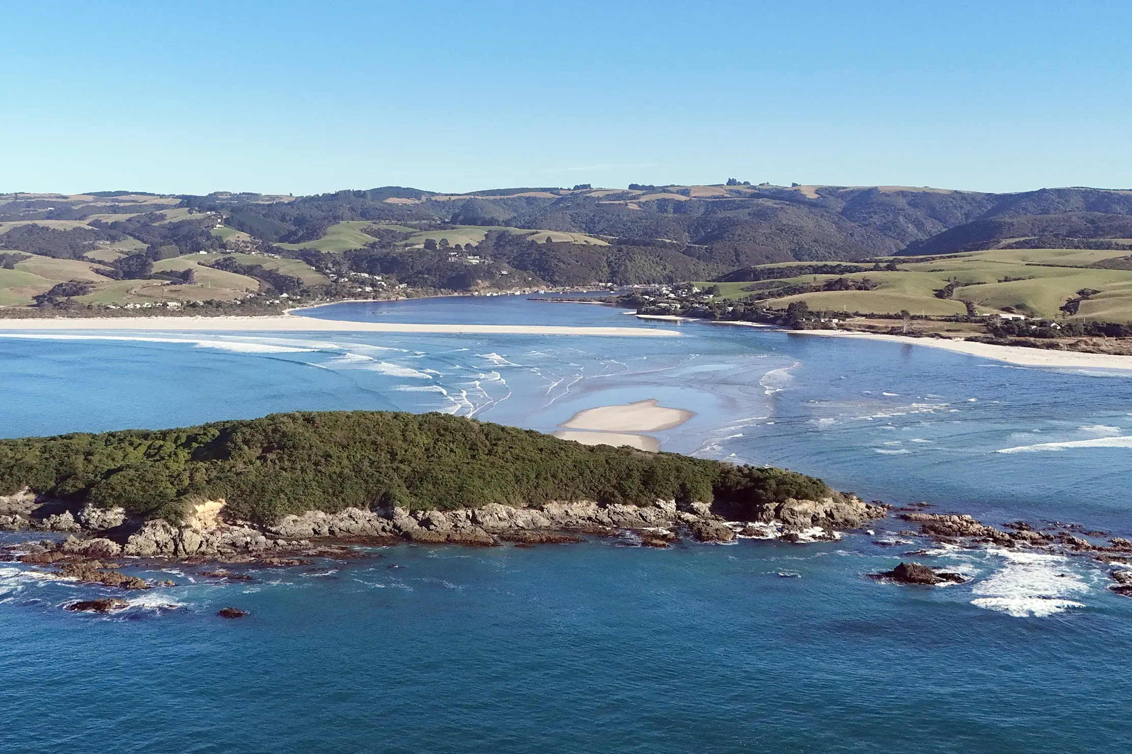 Moturata Island and its associated sandbar - a noted hazard for boaties - at the mouth of the Taieri River, in Taieri Mouth. Photo: Stephen Jaquiery