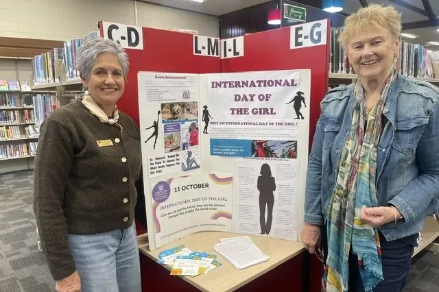 Zonta Club of Oamaru members Jill Squire (left) and Rowena Hutton in front of the club\\'s International Day of the Girl display at the Oamaru Public Library. Photo: Supplied