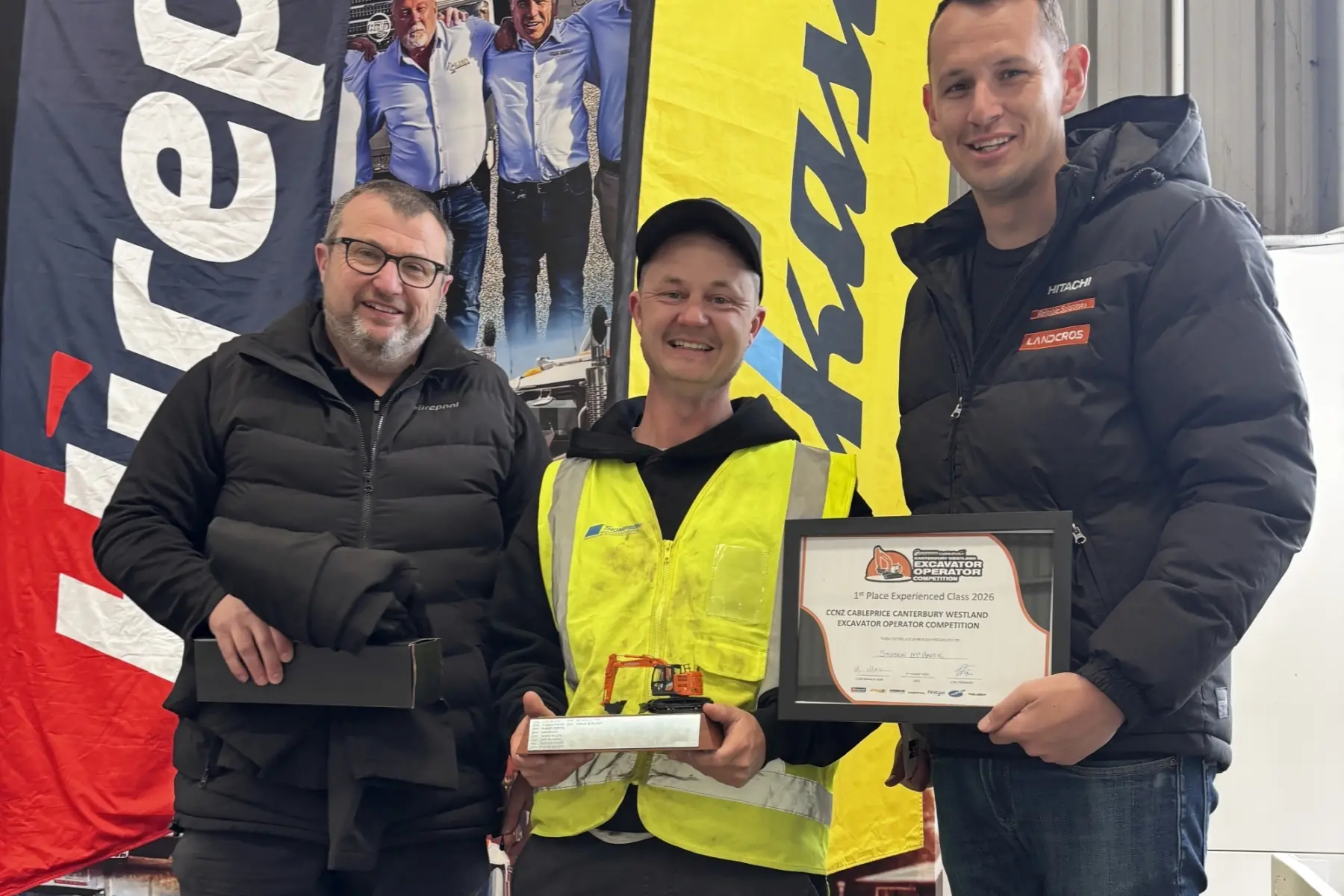 Temuka\\'s Steve McHaffie (middle) was named the Canterbury Westland region\\u2019s top excavator operator, seen here being congratulated by Damon Sweeney from Hirepool (left) and Antony Robinson from CablePrice (right). Photo: Supplied