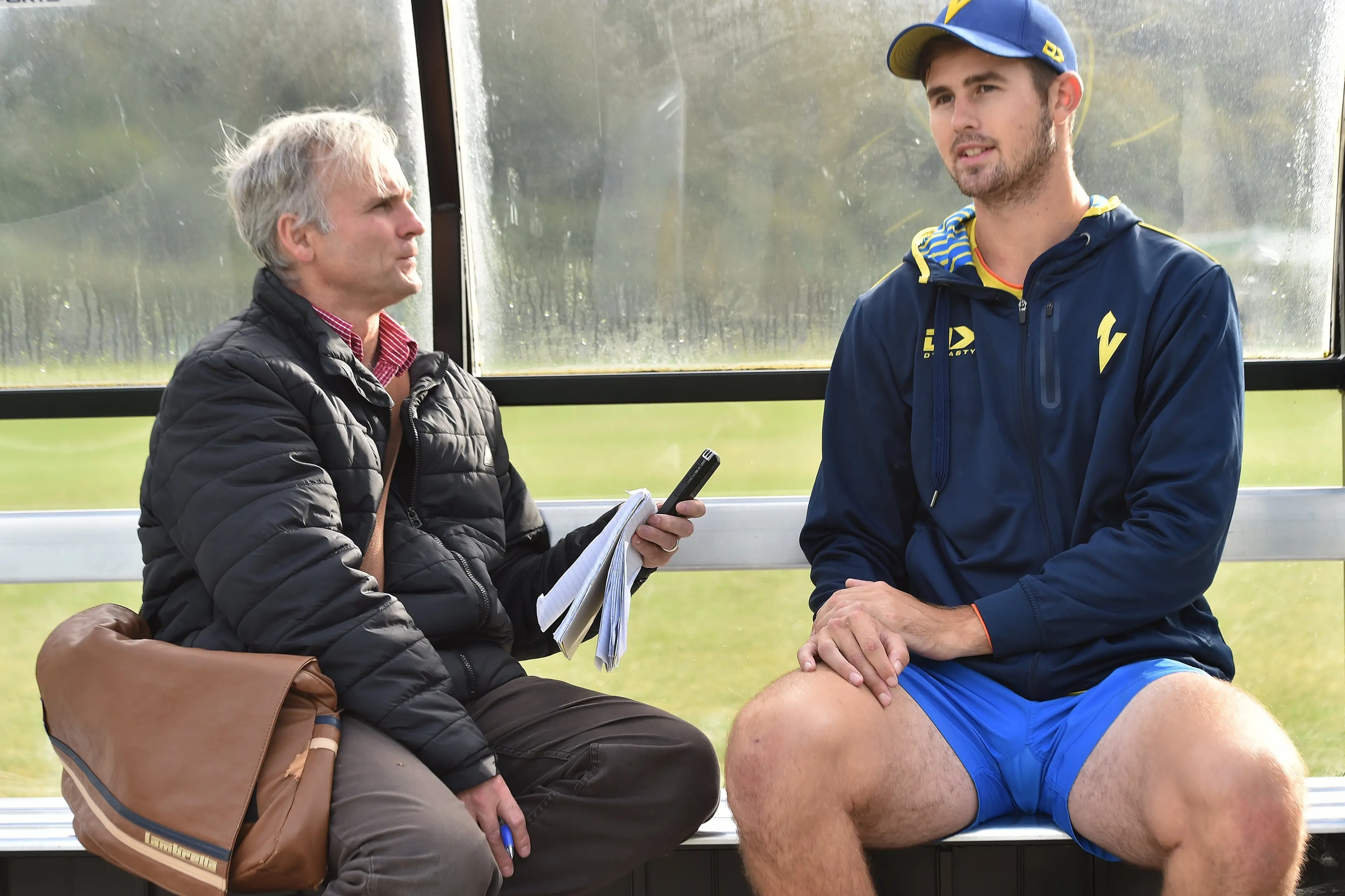 Otago Daily Times reporter Adrian Seconi interviews Volts bowler Jarrod Mckay at Logan Park in 2021. Photo: Peter McIntosh
