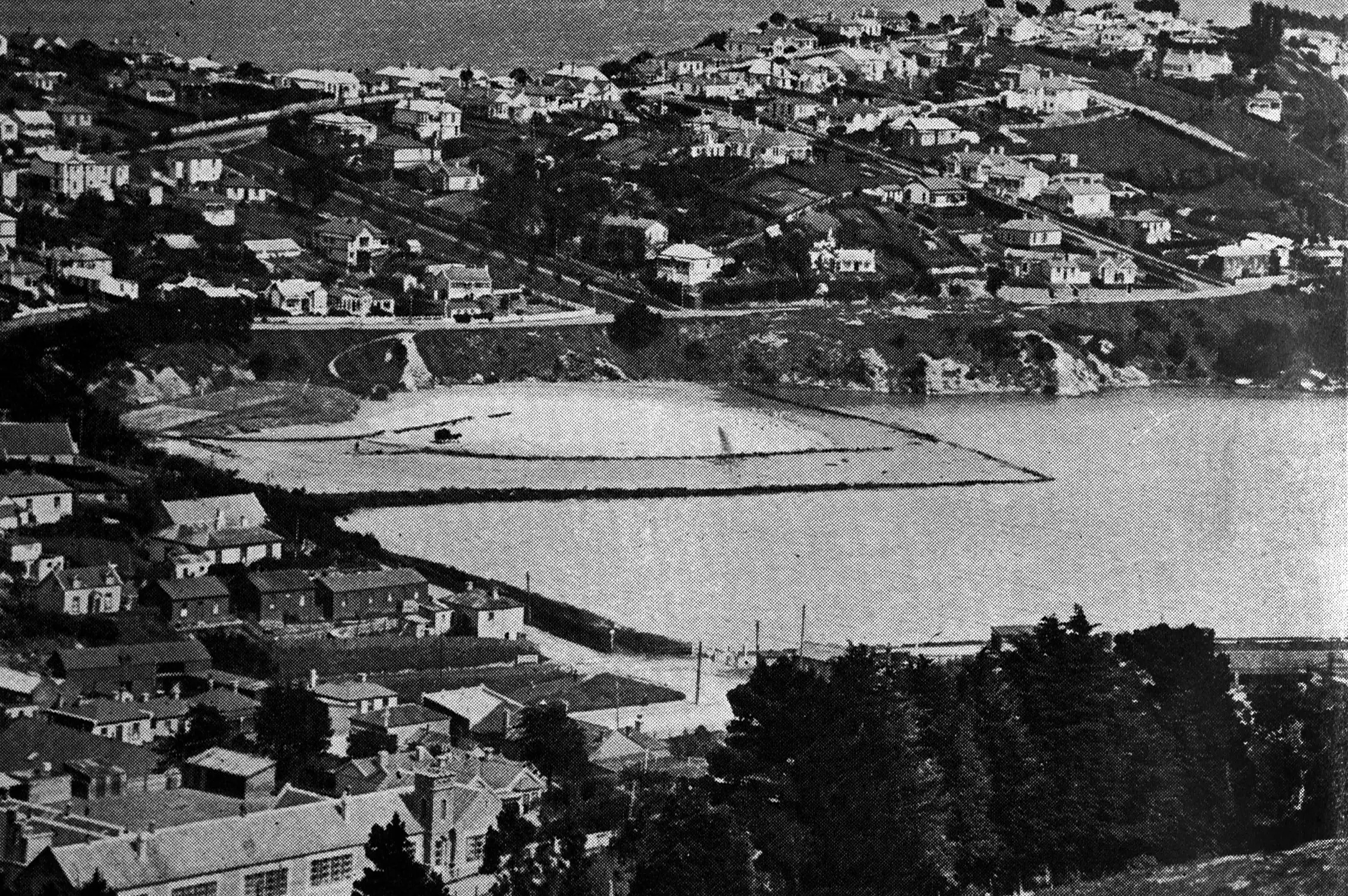An Otago Harbour Board enterprise: reclaiming Mussel Bay at Port Chalmers. Photo: <i>Otago Witness</i>, issue 3795, December 7 1926, page 46