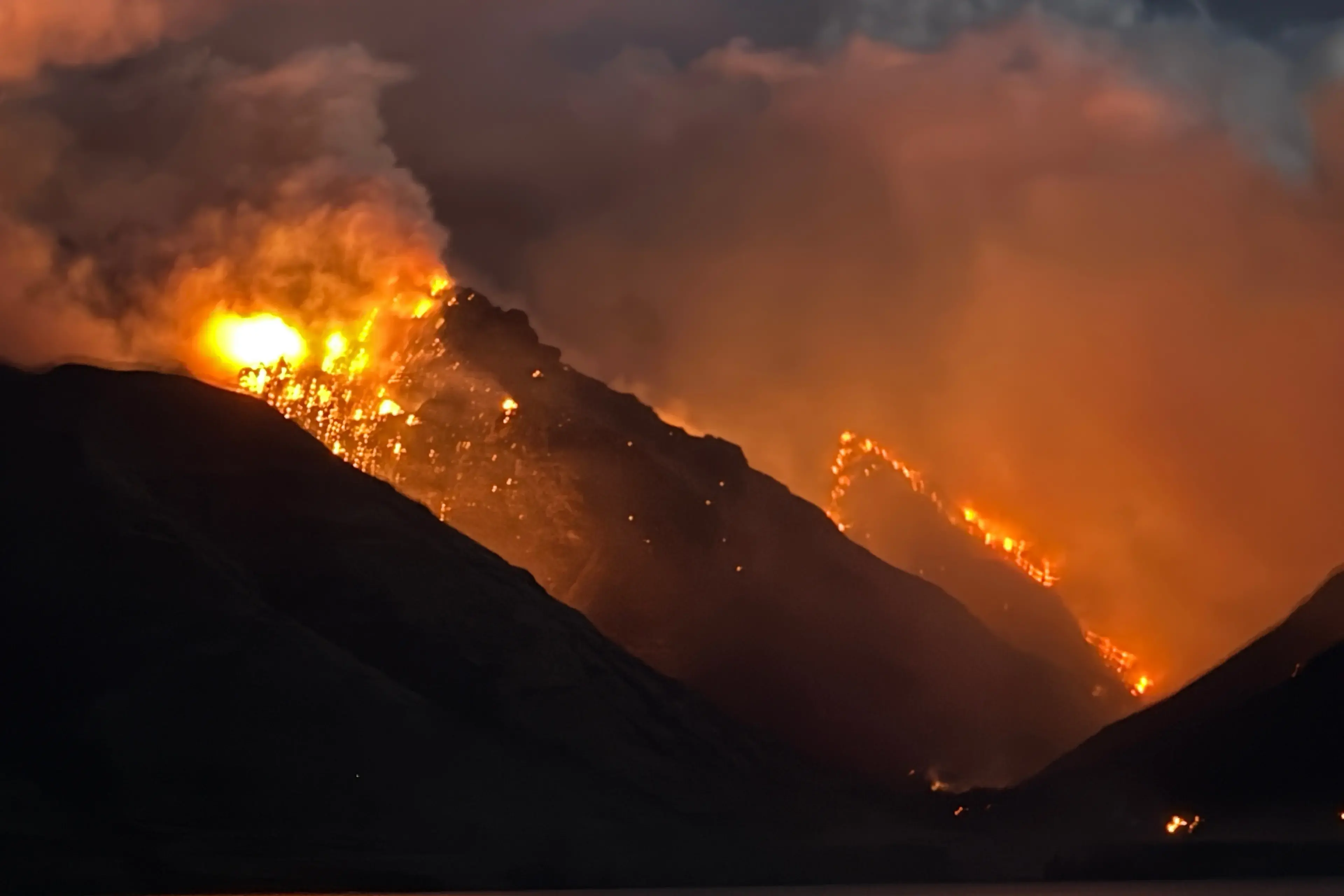 The fire continuing to burn on Tuesday night. Photo: Jo Smith