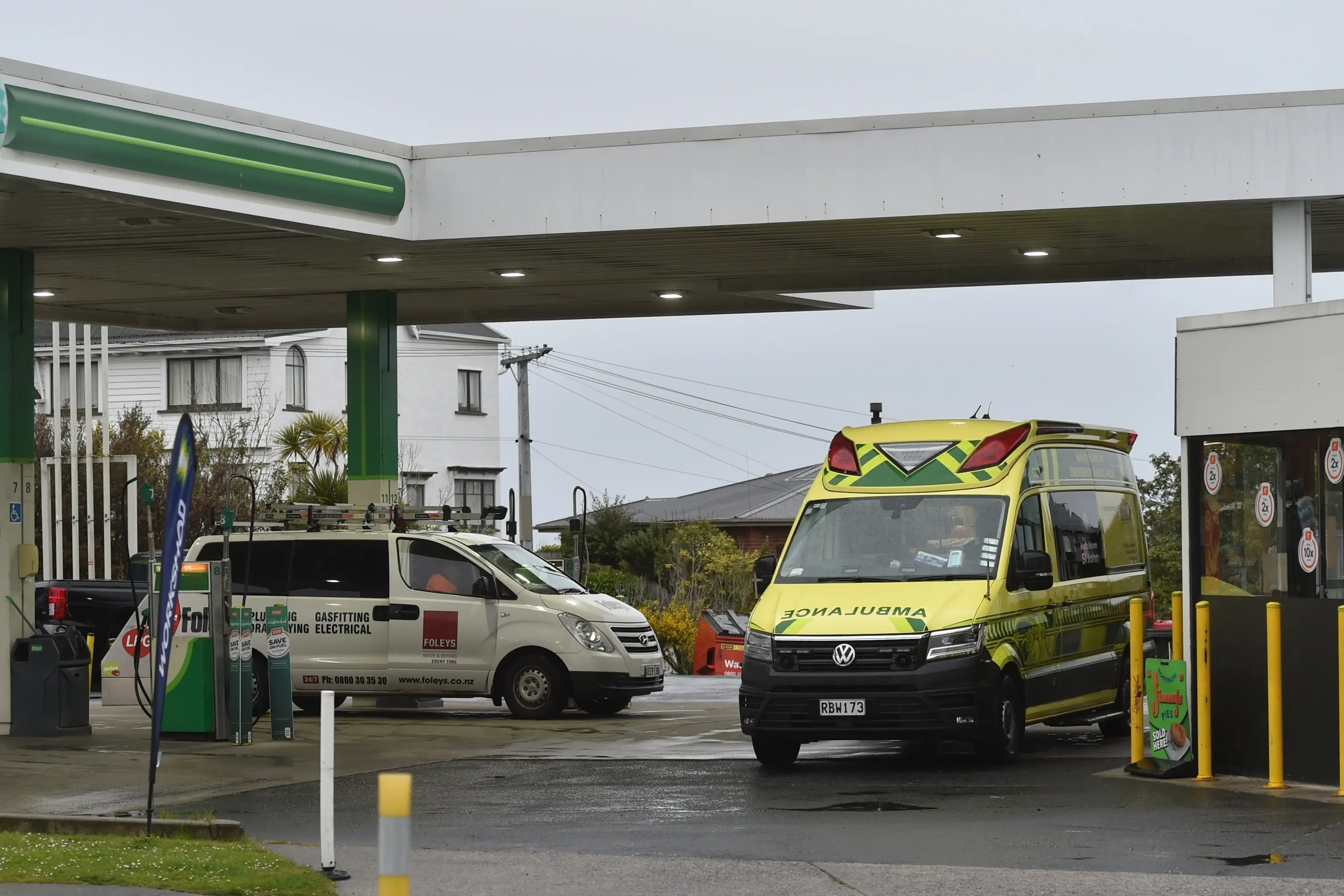 An ambulance attends the scene of a crash between a van and a motorcycle near the BP 2go service station in Mornington.\\nPhoto: Gregor Richardson
