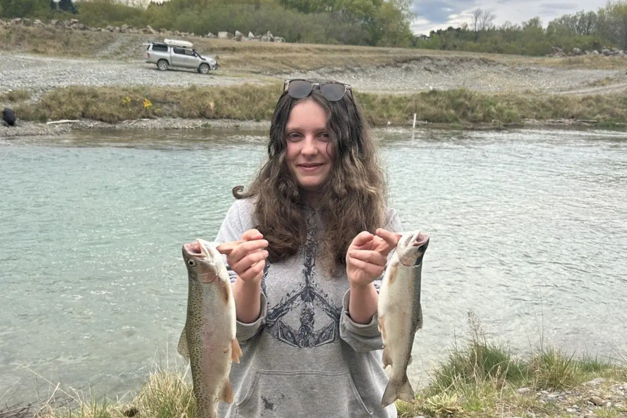 Skyla Stange-Shaw, 21, of Oamaru, was introduced to fishing by her granddad, Wayne Sutton, who has been fishing for 63 years and has lived in Oamaru all his life. After giving fishing a go with him last year, Skyla bought a day licence and the pair headed to Borton\\u2019s Pond, where she managed to land a couple of fish. The experience was enough to get her hooked and she returned this year with a full-season licence. On opening day, Skyla and Wayne were back at Borton\\u2019s Pond, making the most of the start of the new season. Skyla is pictured with two fish Wayne caught during the morning. She was yet to land one herself, but the day was still young at that stage and she was determined to keep trying. Photo: Blake Harper / Fish & Game
