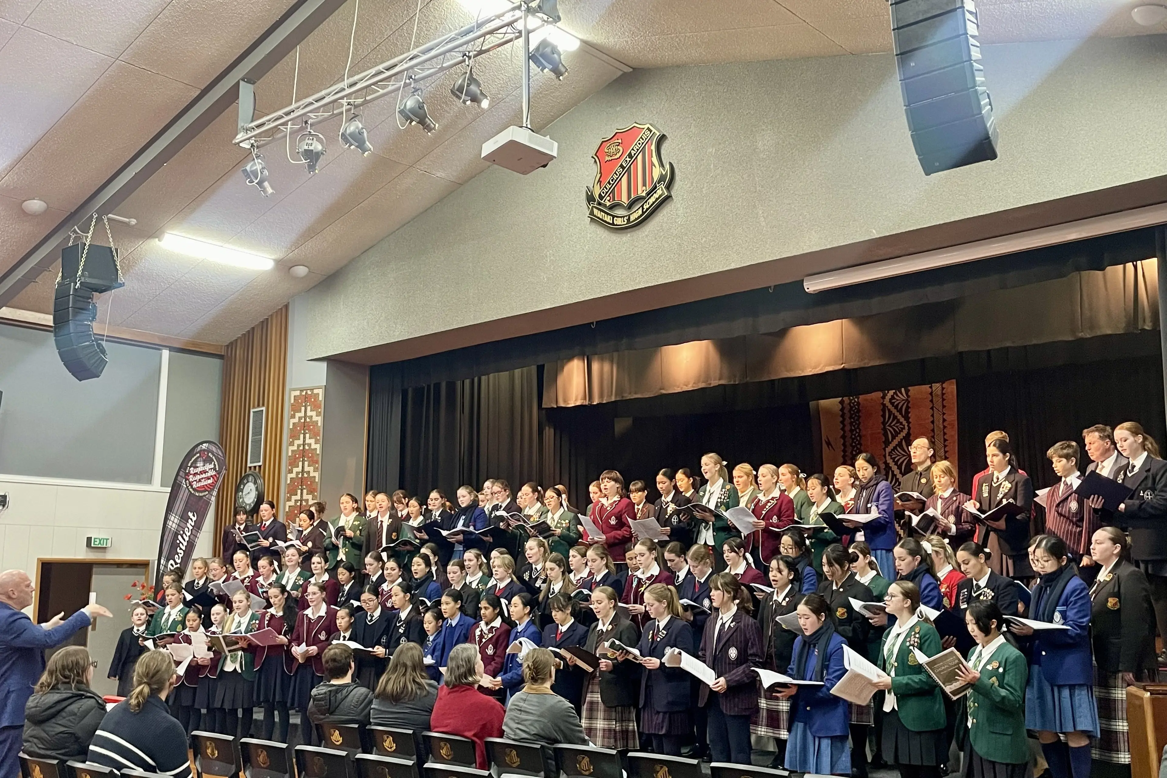 Secondary school combined choirs perform at the H.K. Dunning Hall at Waitaki Girls\\' High School as part of the Sisters of the Church Choral Tour 2026. Photo: Supplied