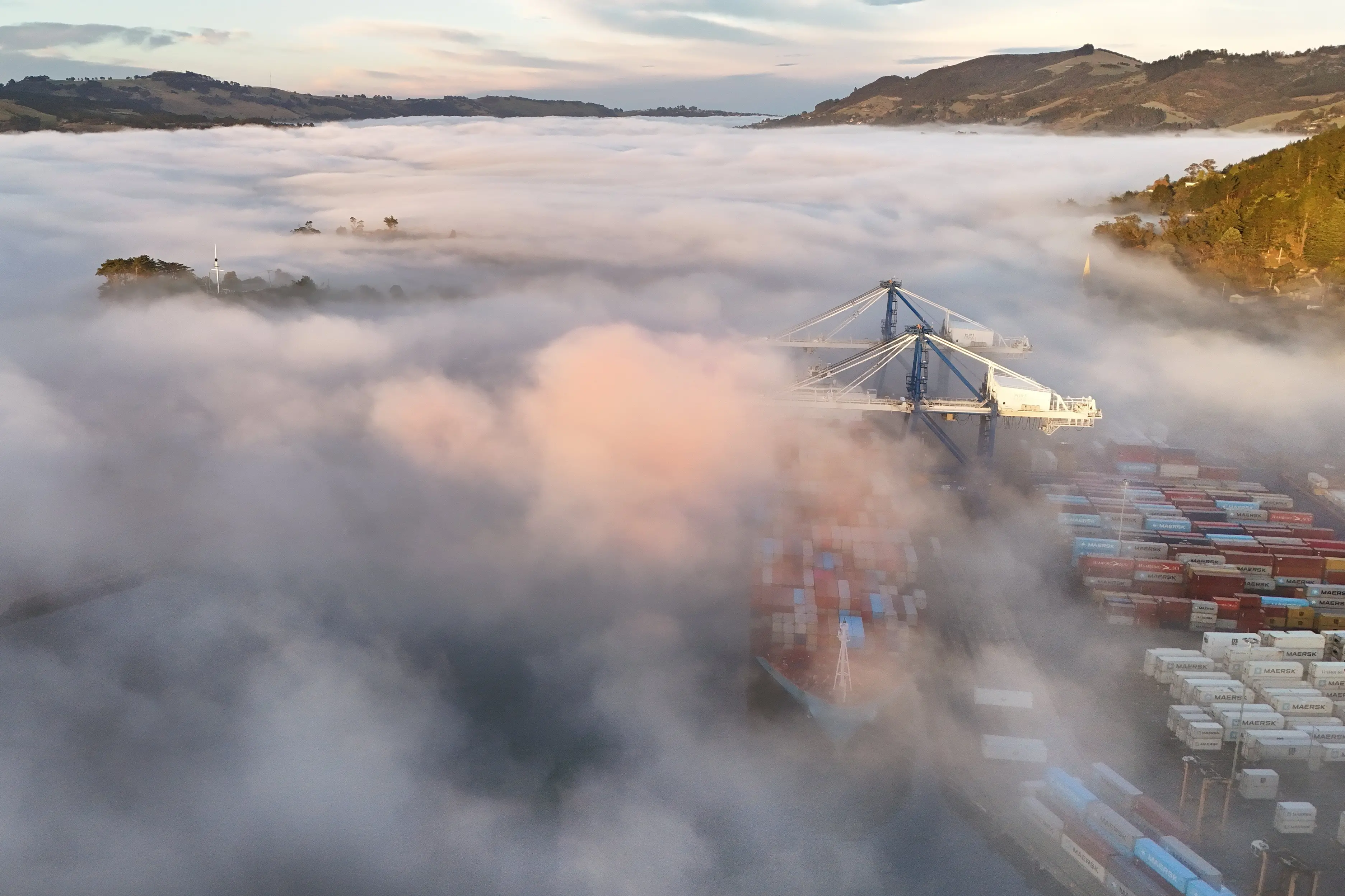 The container ship Maersk Rio Blanco makes a ghostly image as disruptive fog swirls over Port Otago and up the harbour to Dunedin city, in May this year.Photo: Stephen Jaquiery