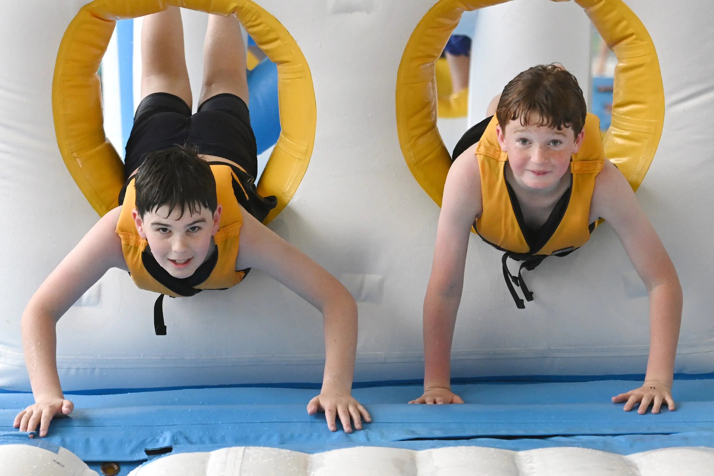 Enjoying Waterworld in Moana Pool on Wednesday were Luca Olsen (left) and Ned Howes, both 11. Photo: Linda Robertson