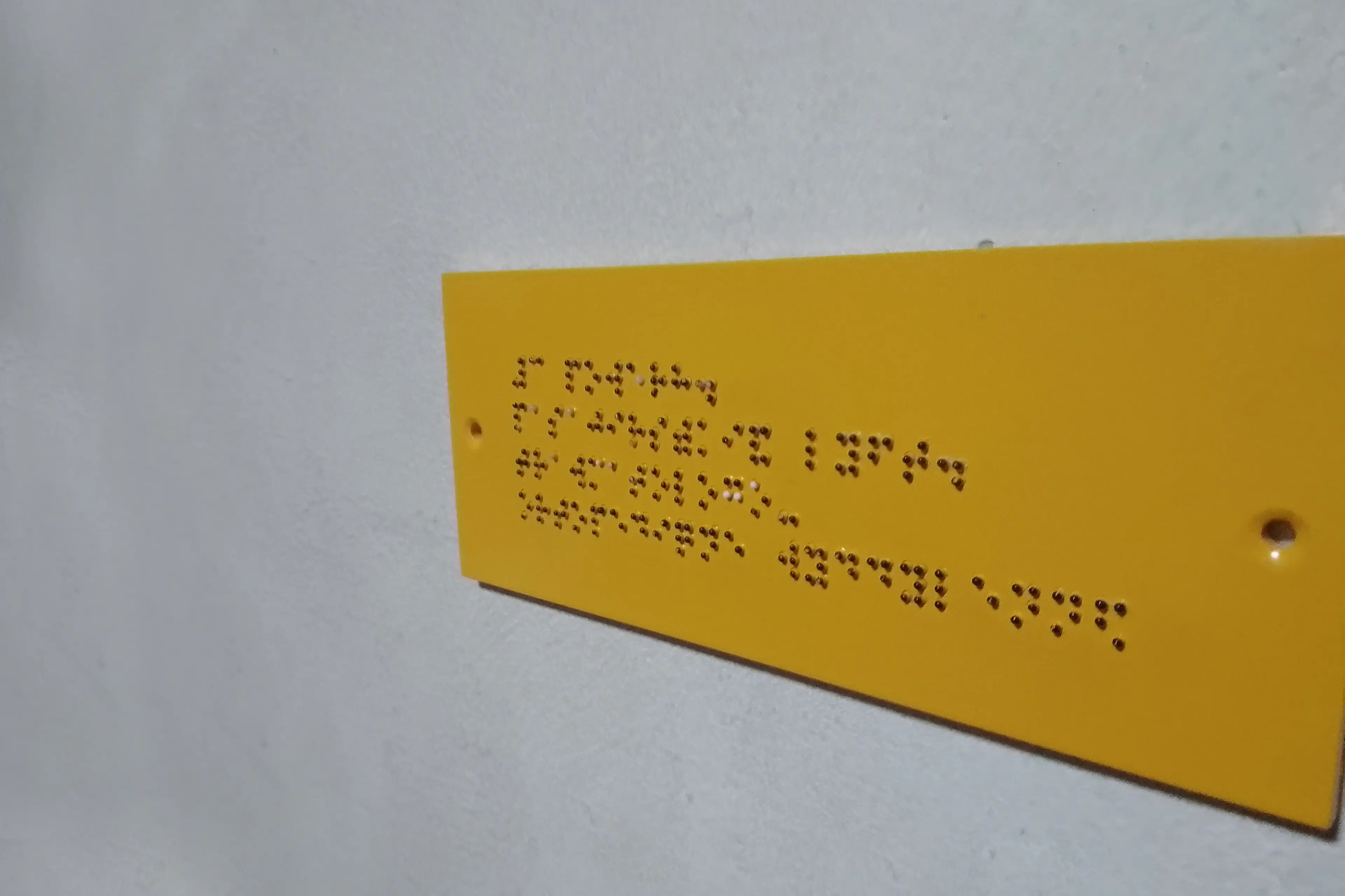 Braille signage near a lift: a bare minimum requirement. Photo: Getty Images