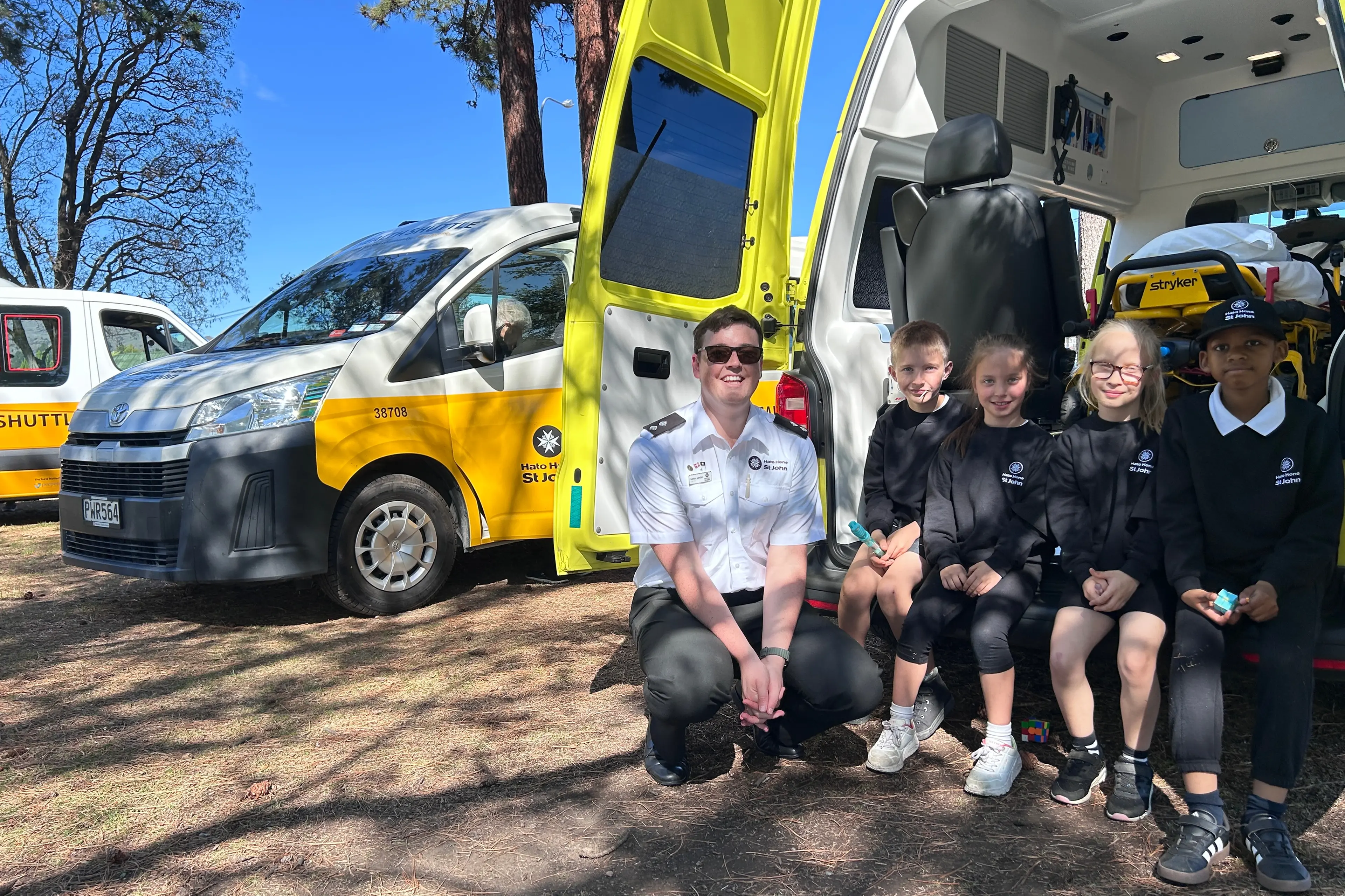 Enjoying a moment in the shade at the St John Ambulance open day at Pioneer Park are (from left) divisional youth manager Kohan Carden, Jack, 9, Alexandra and McKenzie, both 8, Monaghan and Sibu Ncbe, 10. Photo: Julie Asher