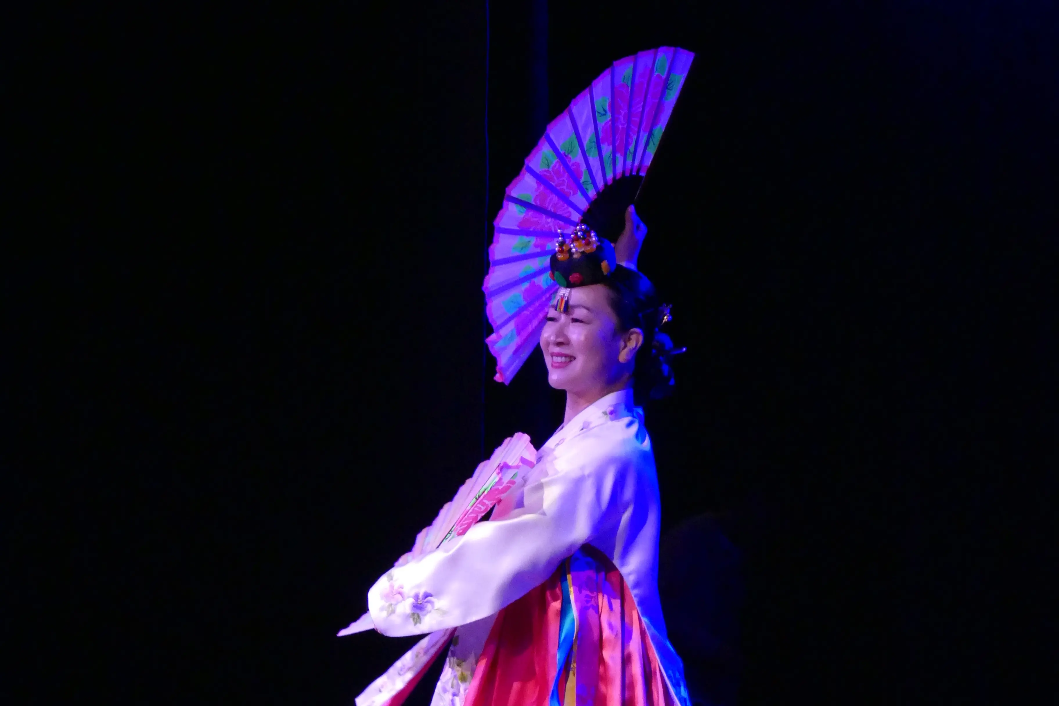 Gyojin Yoon, of Christchurch, performs a fan dance during Saturday\\'s Ten-Ten Korean Day celebration at the Queenstown Memorial Centre on Saturday. Photo: Tracey Roxburgh