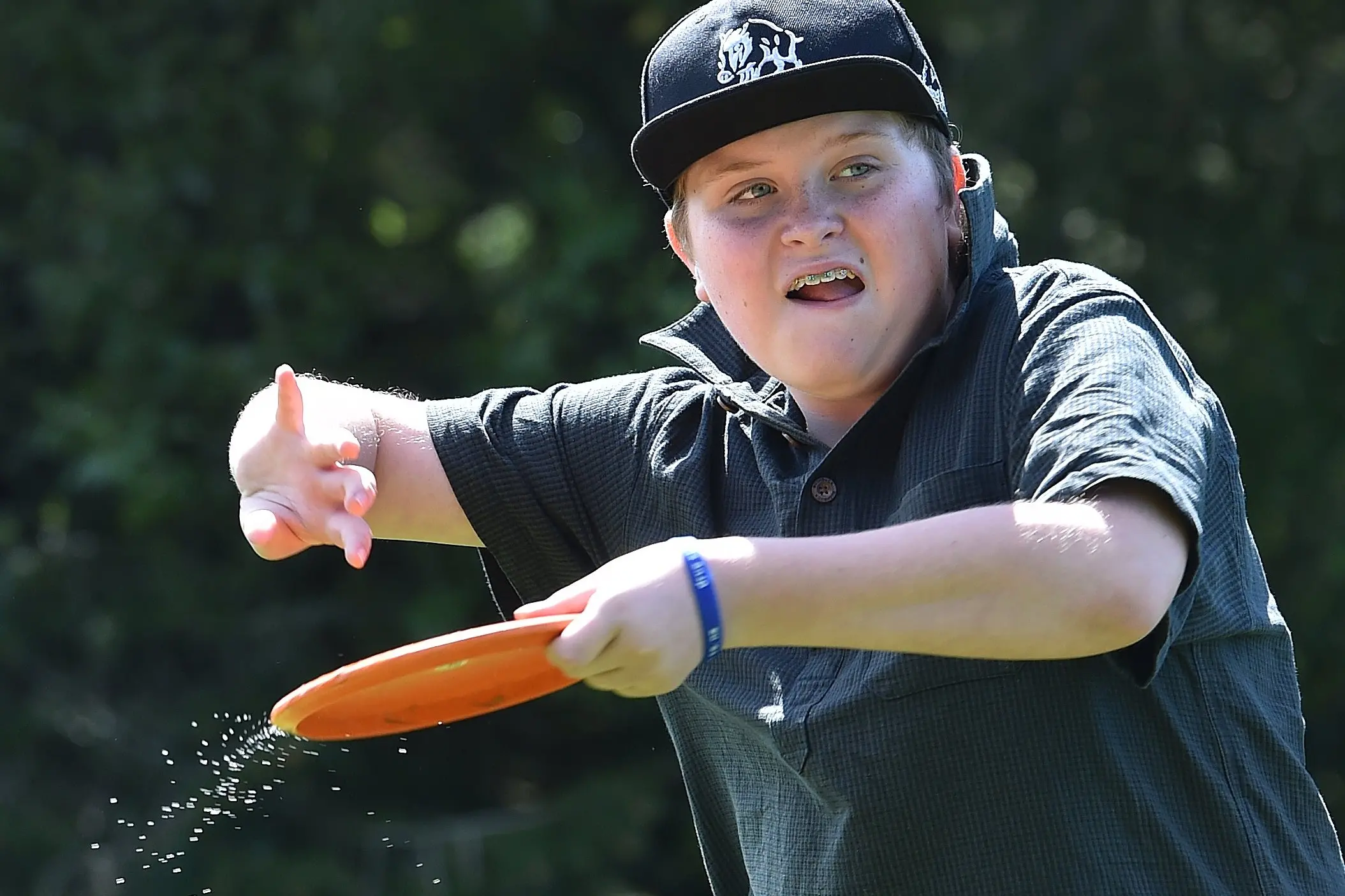 Darcy Johnston, 13, of Palmerston, participates in the New Zealand Disc Golf Junior Series at Brockville Park in Dunedin on Saturday. Photo: Peter McIntosh