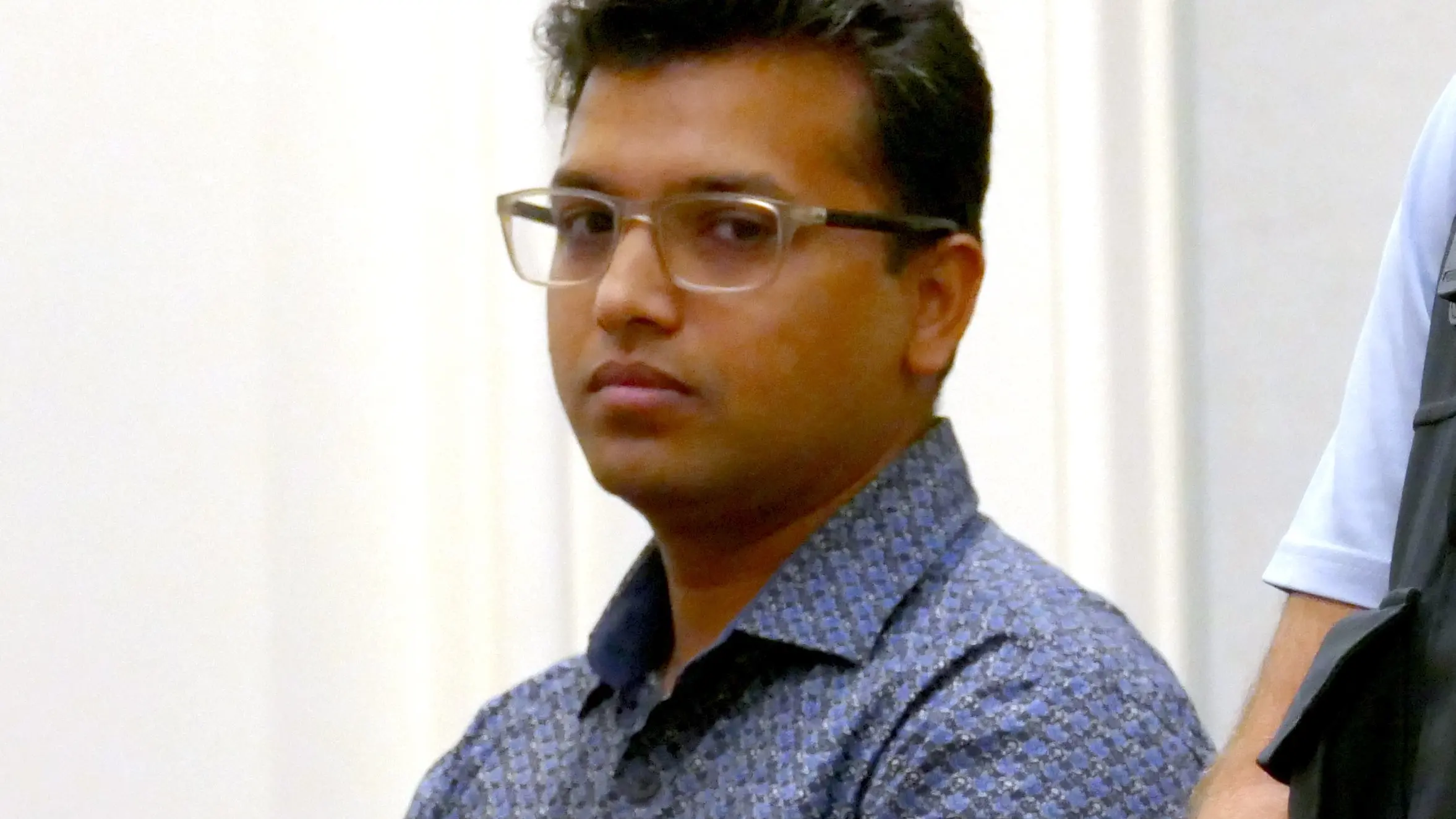 Man who took fake bomb into airport gains law degree but blocked from joining legal profession