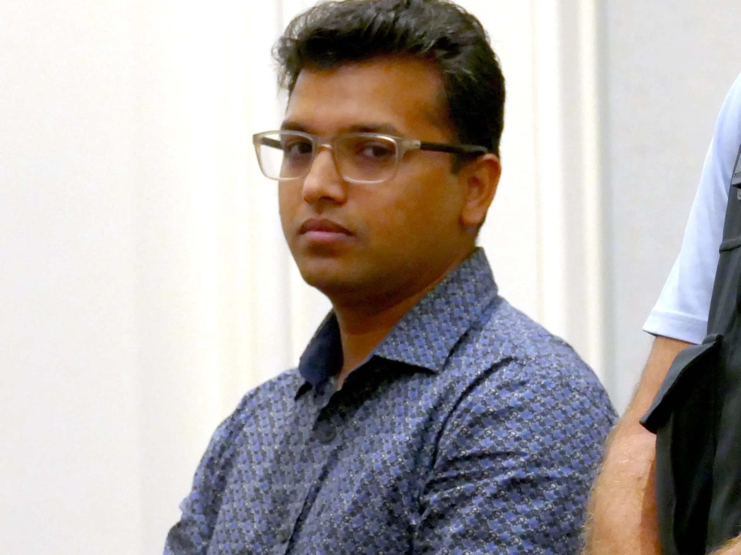 Man who took fake bomb into airport gains law degree but blocked from joining legal profession