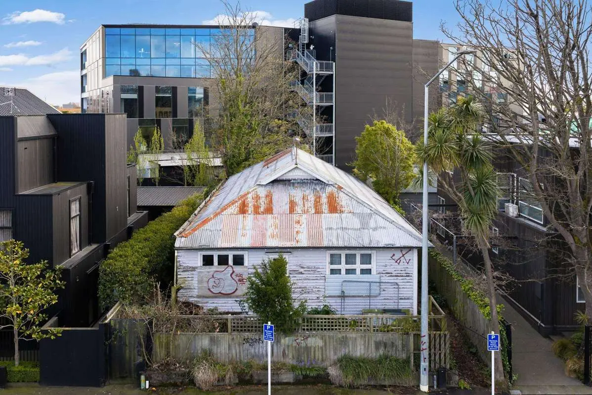 The quake-damaged bungalow at 25 Salisbury St in the central city is being sold for the first time in 40 years after sitting uninhabited since the 2011 earthquake. Photo: Supplied