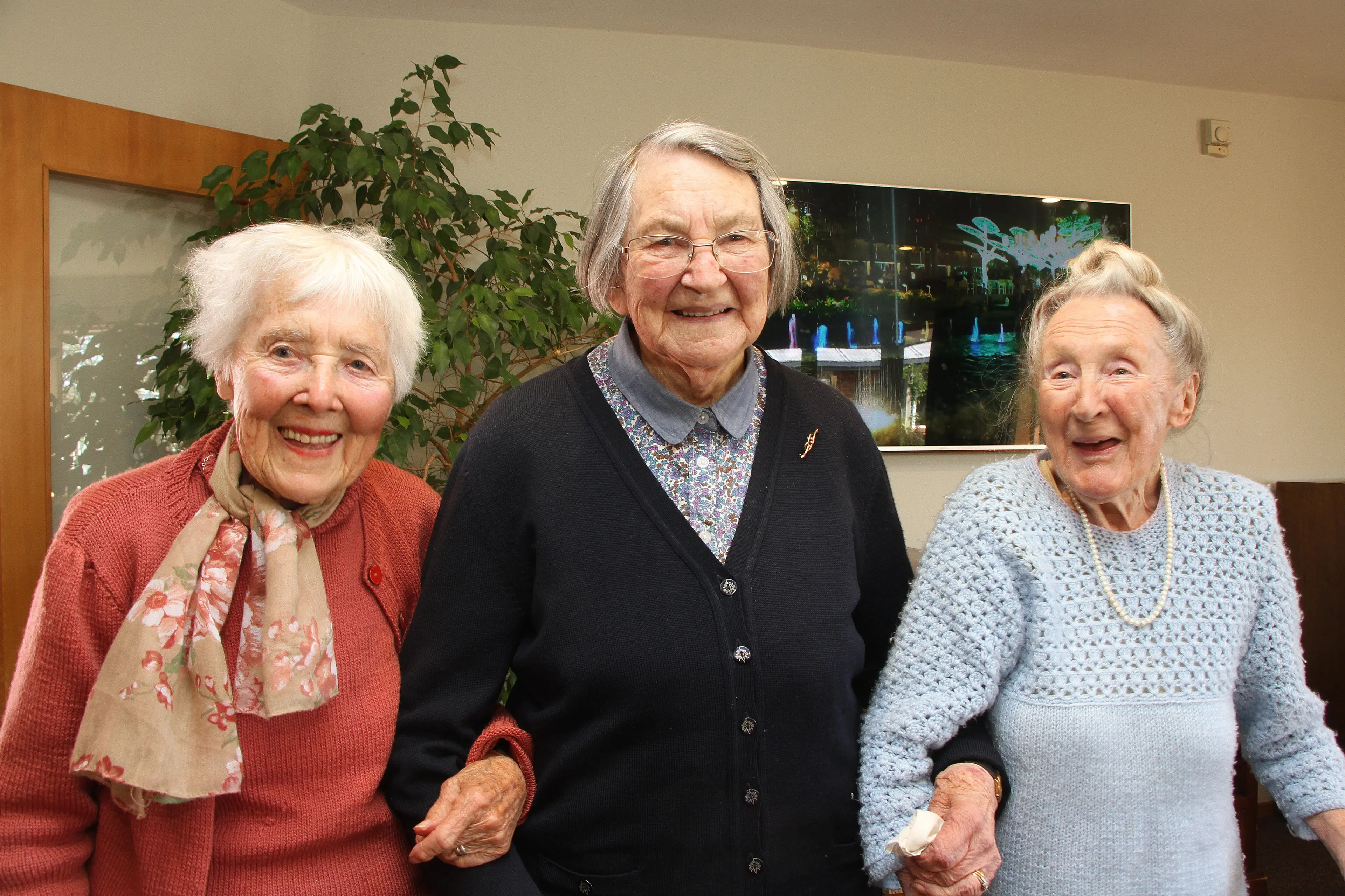 Celebrating 100 plus ... Amberley Rest Home Resident (from left) Joy Forbes (102) helps fellow residents Noella Farquhar and Joan Parsons celebrate their 100th birthdays. Photo: John Cosgrove