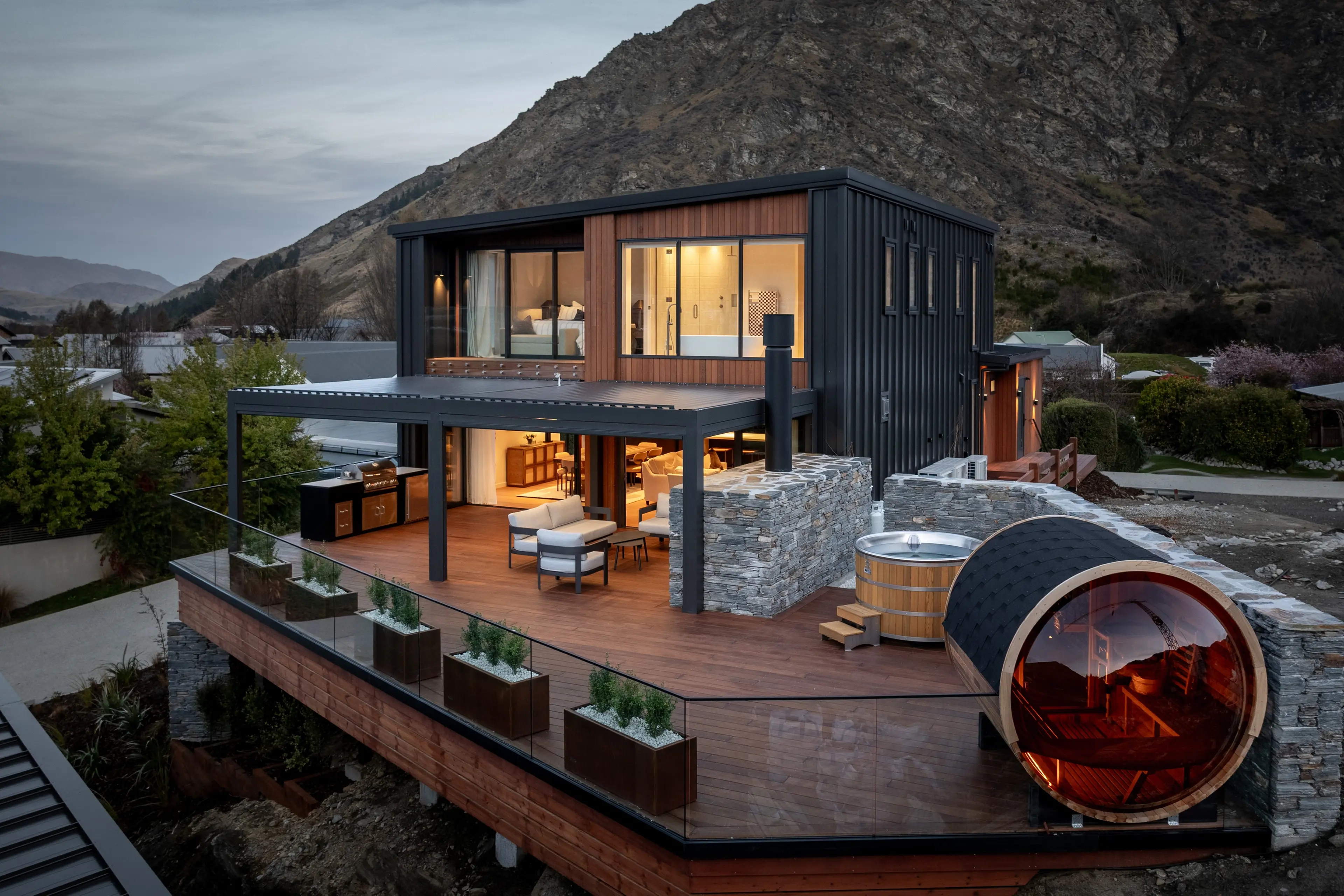 Built for entertaining: This Arthurs Point residence for sale incorporates substantial decking. Photo: Supplied