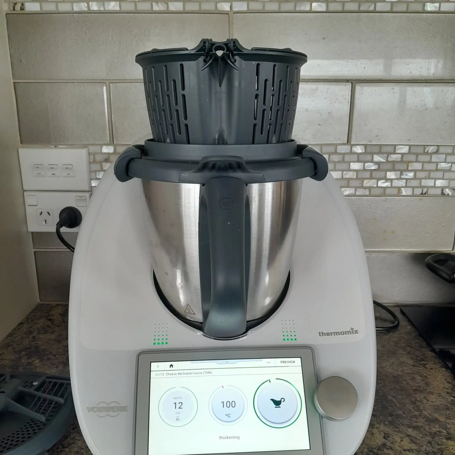 Cooking machine helping feed elderly