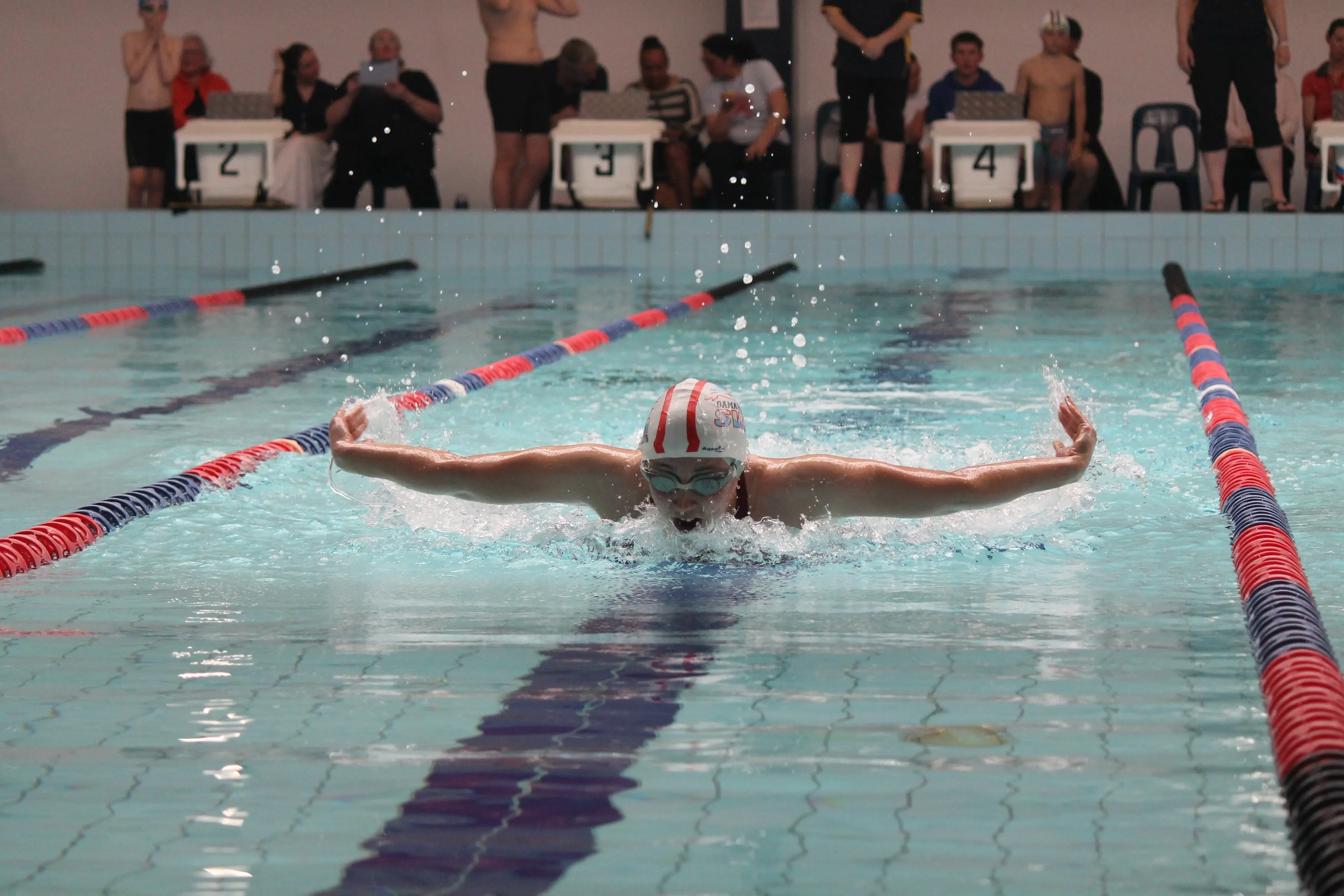 Leone Groot, 16, competing in the butterfly. Photo: Elizabeth Soal
