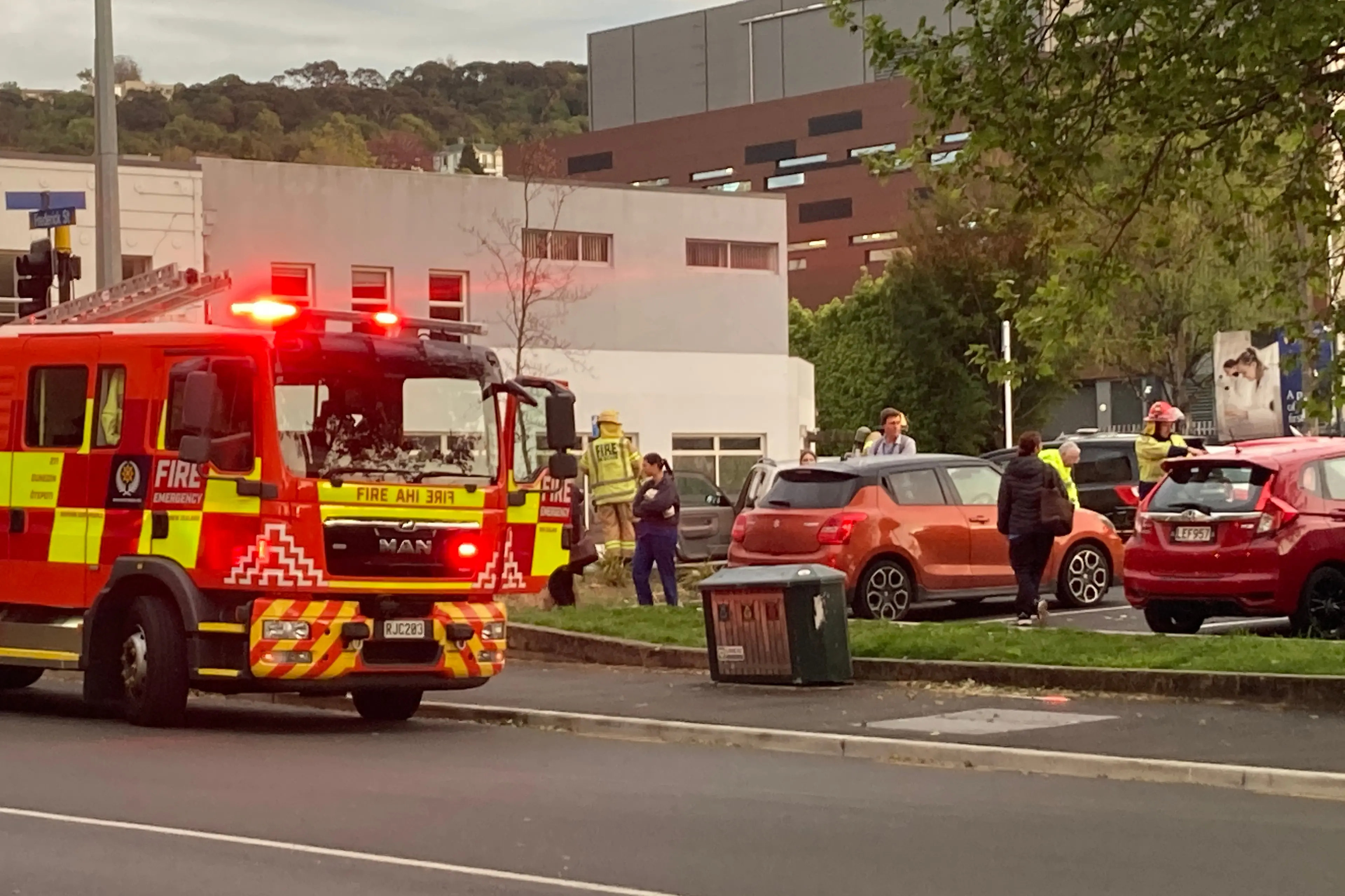 <p>Emergency services at an incident in a Fredrick St car park where a person was reported to be trapped between two cars. Photo: Stephen Jaquiery </p>\\n
