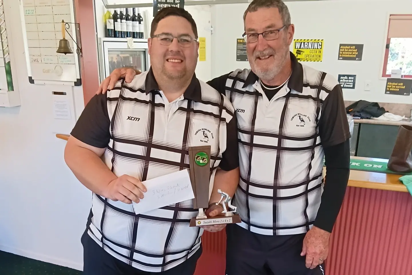 Sam Morton (left) and Dave Wood celebrate their win at the West End Suzuki 2x4x2 pairs tournament over the weekend. Photo: Supplied